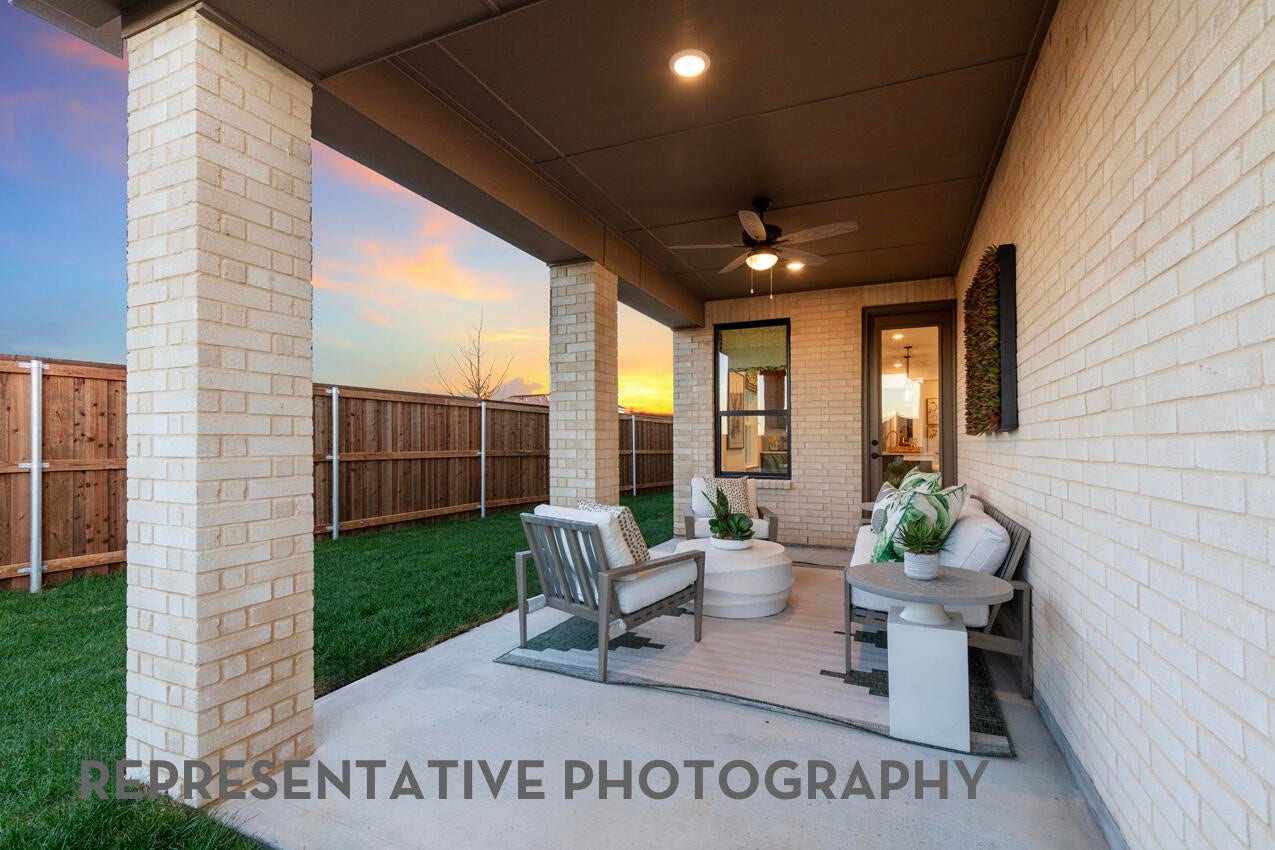 3435 Loam Lane, Richmond, TX 77406 A covered patio provides a comfortable outdoor space perfect for gathering, relaxing, and enjoying time together in any weather.