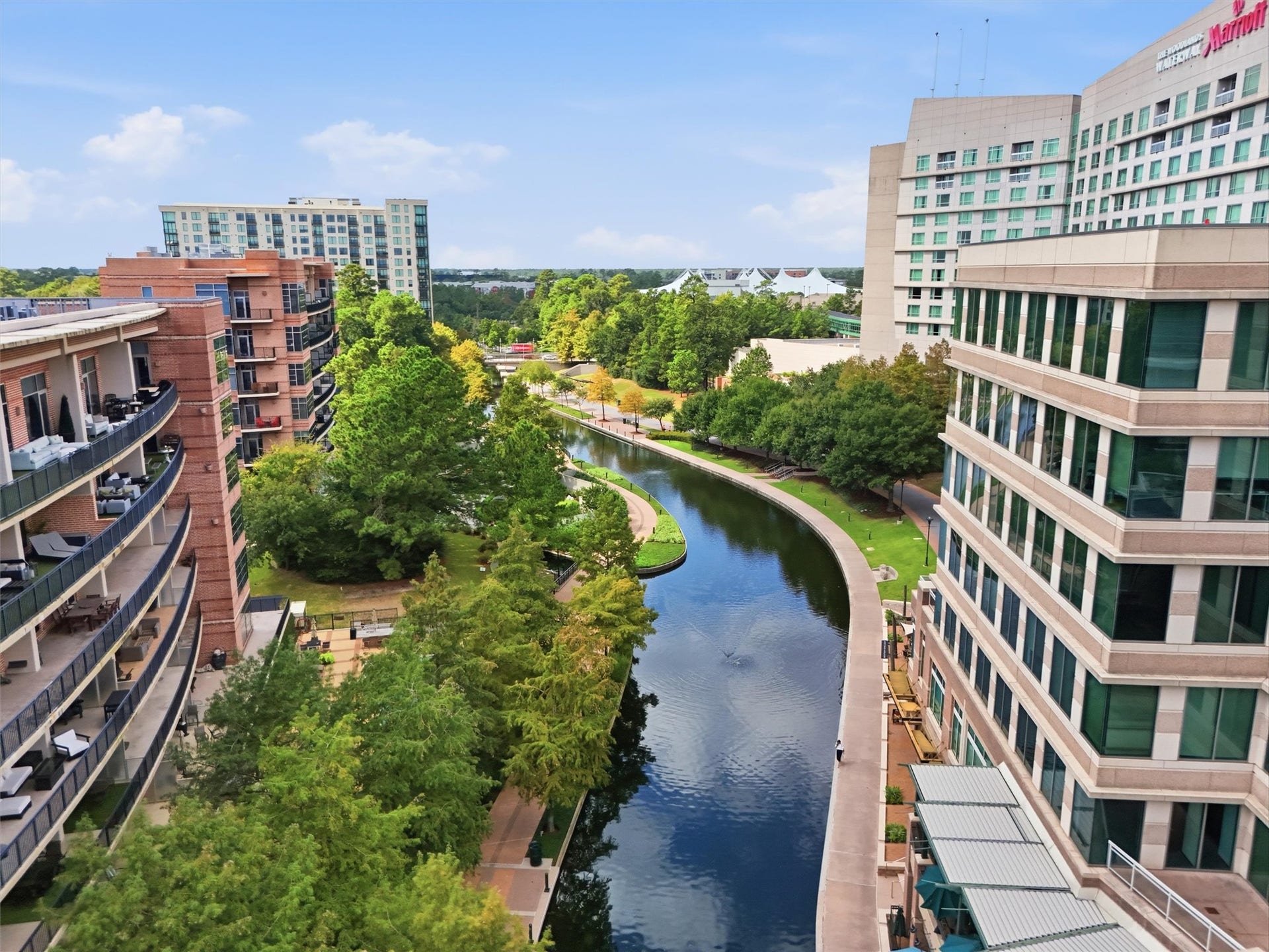 3 Waterway Court, #2D, The Woodlands, TX 77380 Enjoy a unique perspective of The Woodlands Waterway, surrounded by beautiful architecture and greenery.