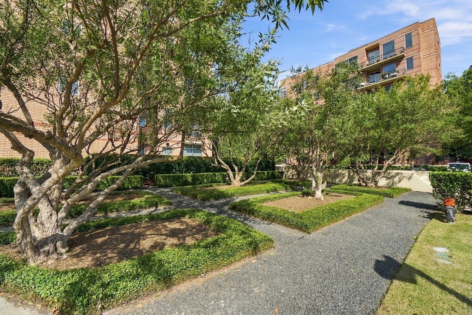 3 Waterway Court, #2D, The Woodlands, TX 77380 Beautifully landscaped walking paths wind through mature trees and peaceful green spaces.