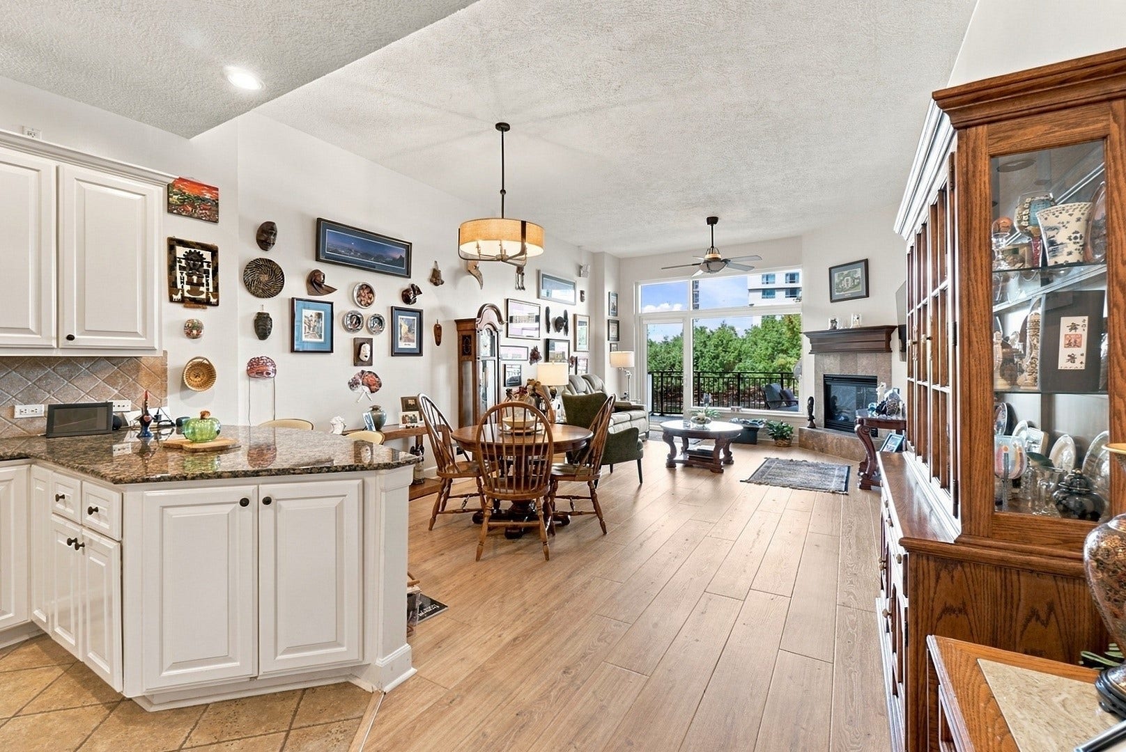 3 Waterway Court, #2D, The Woodlands, TX 77380 Beautiful open-concept design connects the kitchen, dining, and living spaces, ideal for everyday living and entertaining.