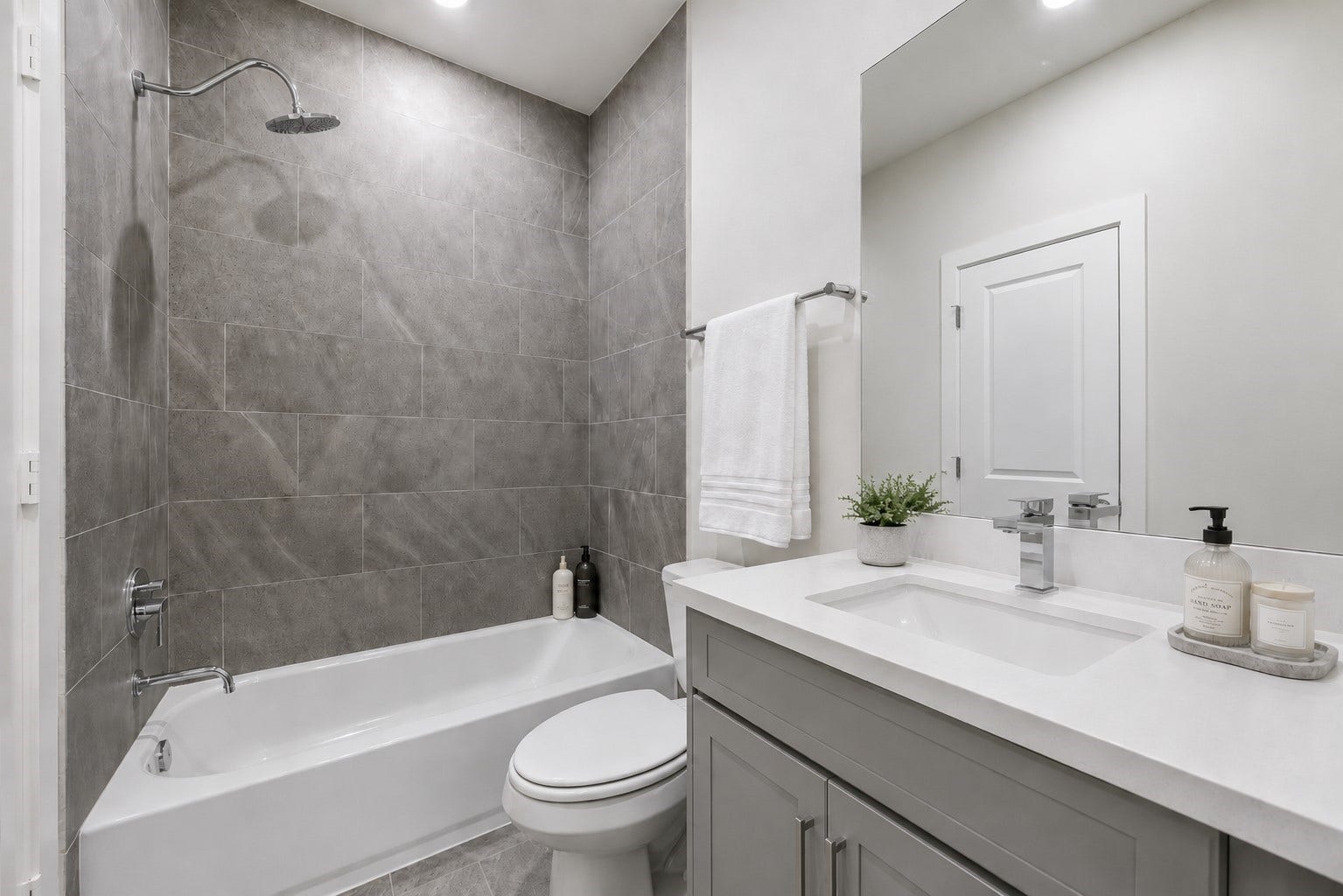 6382 Paddington Bend Drive, Houston, TX 77008 Representative photo showing the communitys model home secondary bathroom. Layout and selections may vary.
