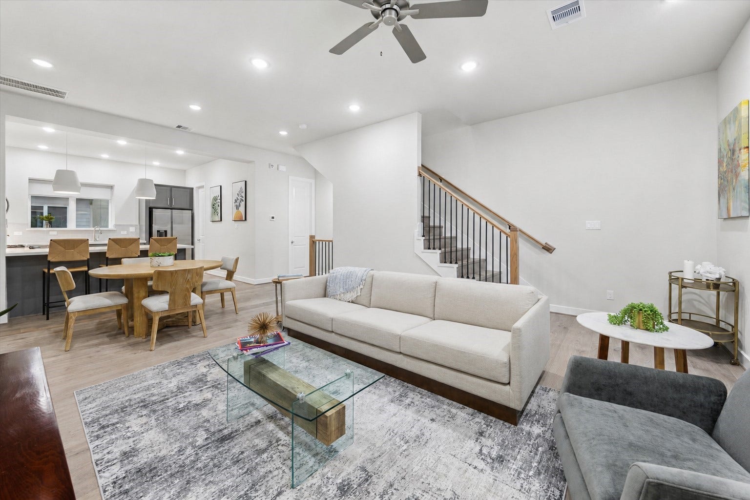 6382 Paddington Bend Drive, Houston, TX 77008 Representative photo showing the communitys model home living room. Layout and selections may vary.