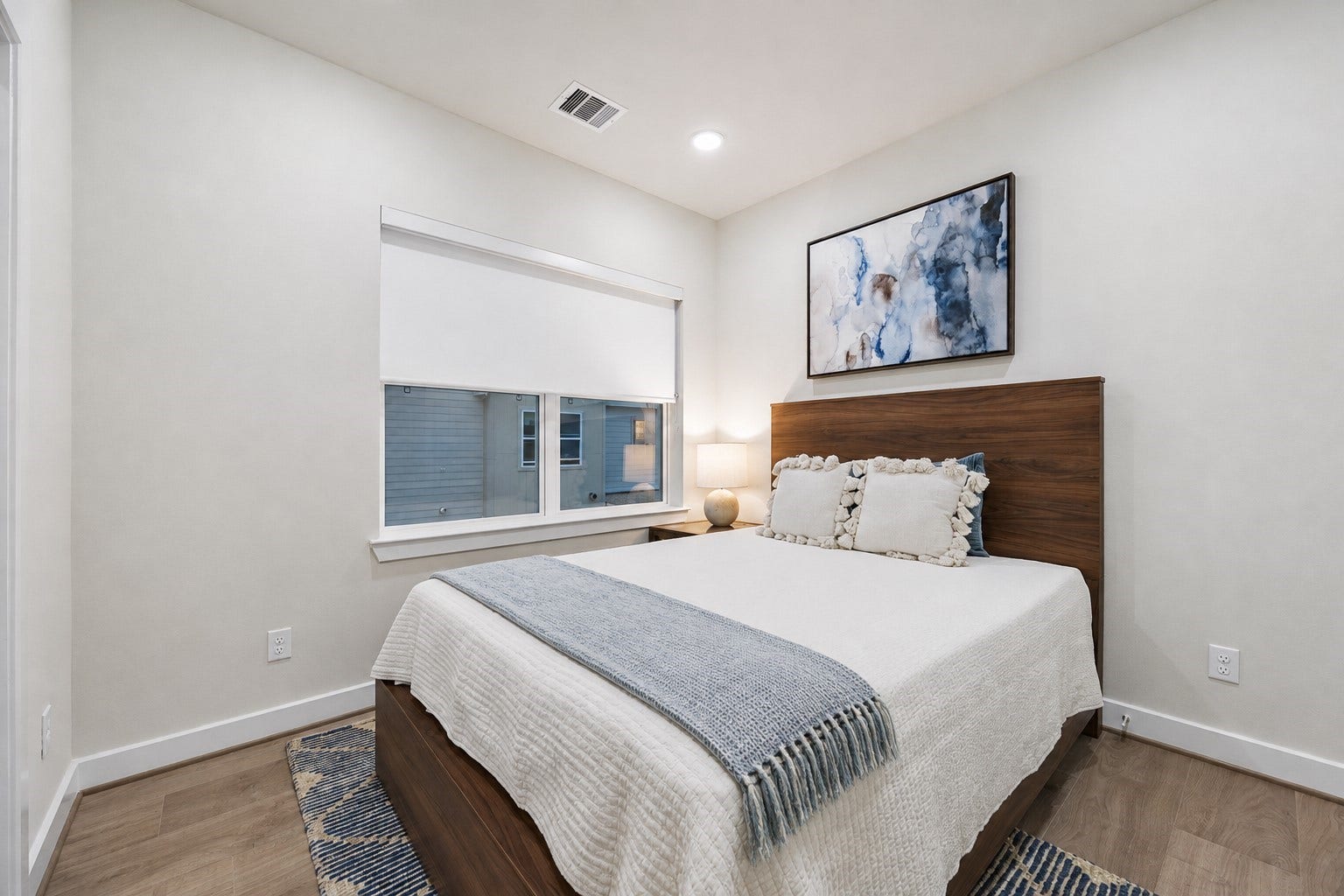 6382 Paddington Bend Drive, Houston, TX 77008 Representative photo showing the communitys model home secondary bedroom. Layout and selections may vary.