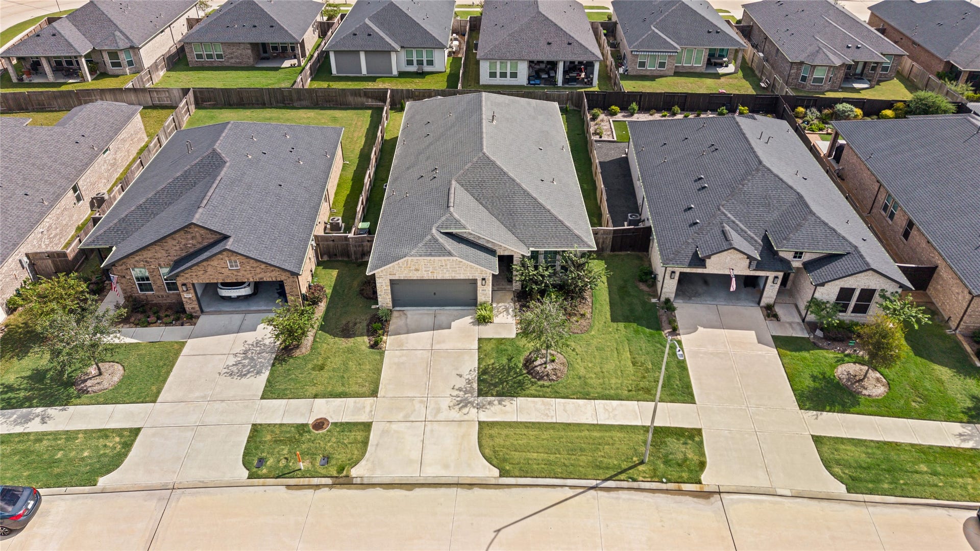 An aerial view offers perspective on the home, surrounding streetscape and neighborhood setting.