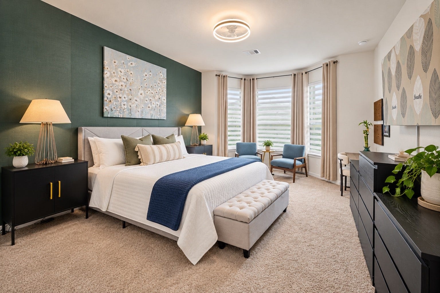 The owners suite feels calm and spacious, enhanced by a bay window and abundant natural light.