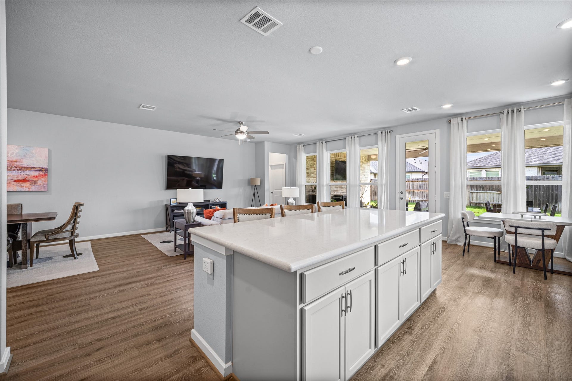 The spacious island creates a natural centerpiece for meal prep, casual dining and conversation.