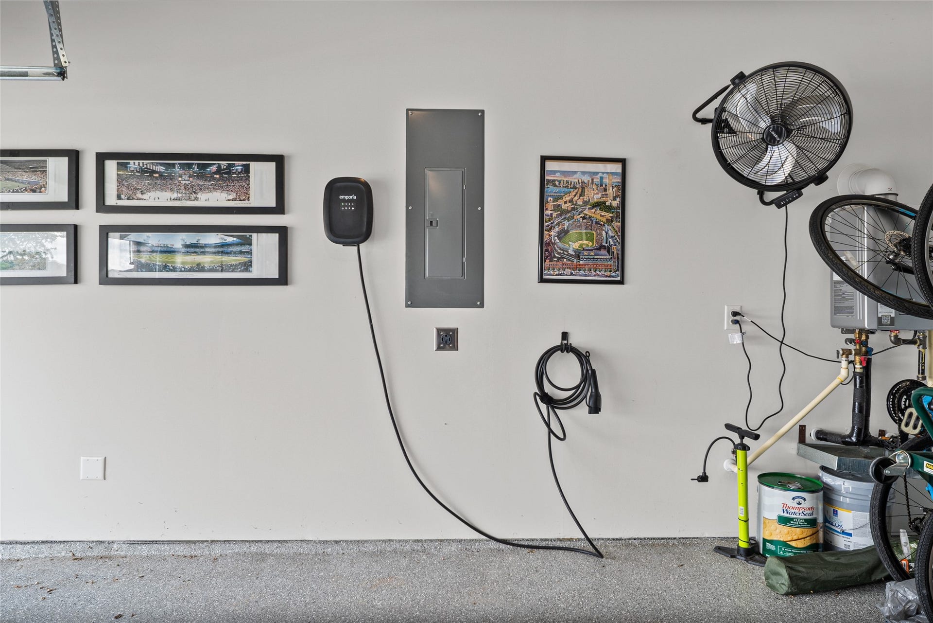 EV charging equipment and an additional 240V circuit add practical convenience to the garage.