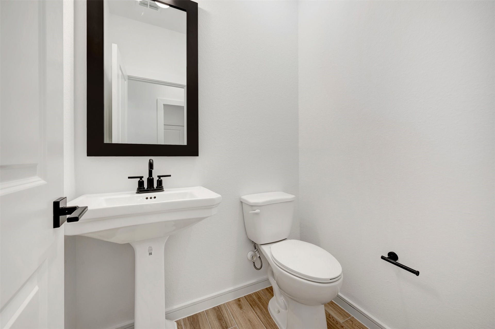 Half bath (*Photo not of actual home and used for illustration purposes only.)