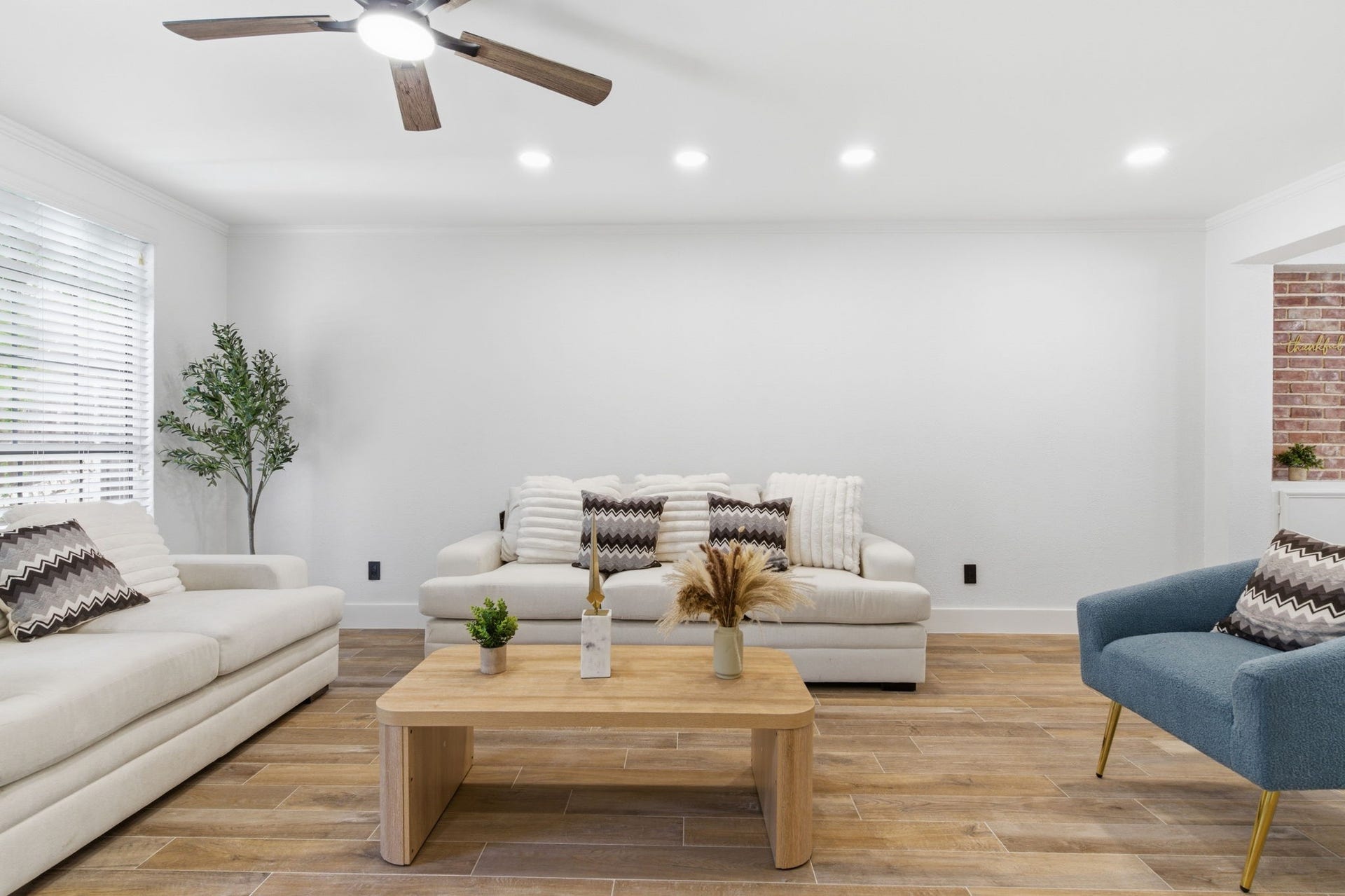 811 Lovett Boulevard, #21, Houston, TX 77006 There is plenty of room to create a comfortable seating arrangement without making the living room feel crowded.