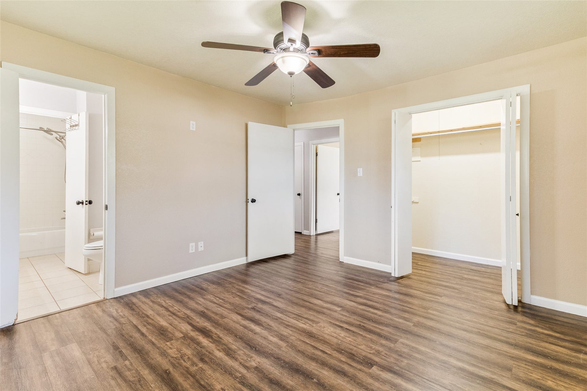 404 S 14th Street, West Columbia, TX 77486 Direct access to a private ensuite bath and walk-in closet (8x4) adds everyday convenience by keeping your daily routines within your own space.