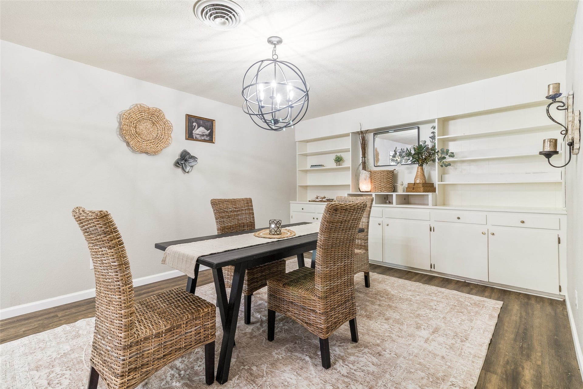 404 S 14th Street, West Columbia, TX 77486 Dedicated Dining Room (14x13) with a modernized light fixture and a wall of built-in's to showcase favorite pieces and decor.