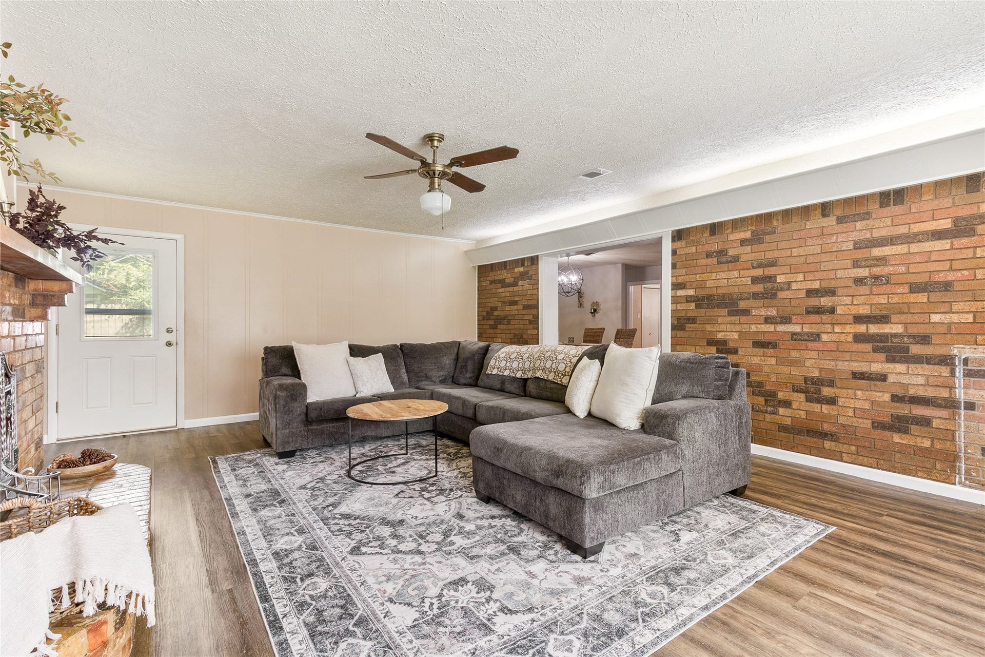 404 S 14th Street, West Columbia, TX 77486 Family room (21x17) offers room for a larger seating arrangement while keeping the front living area available for other uses, with direct backyard access extending gatherings outdoors.