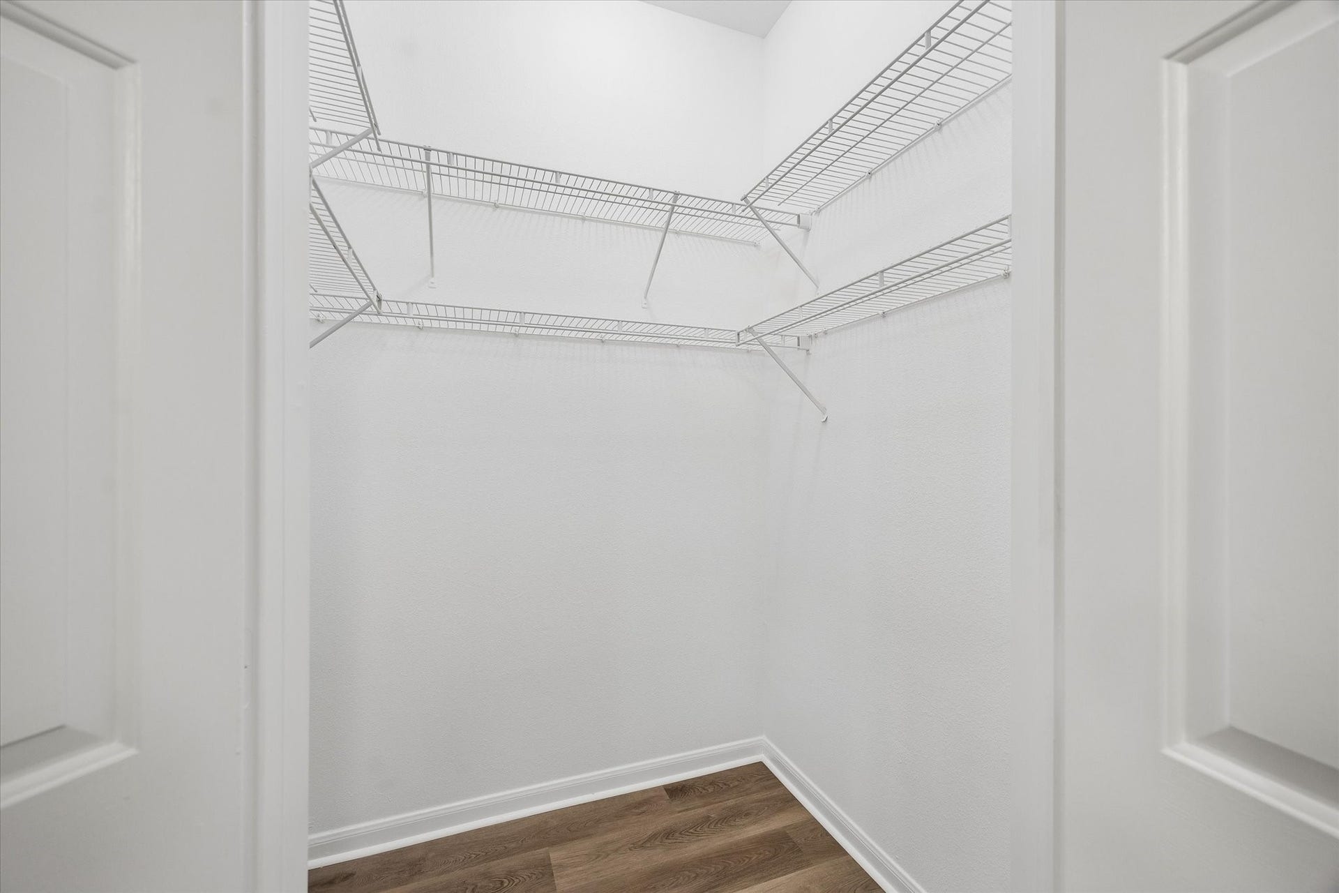 Primary bedroom has two walk-in closets.