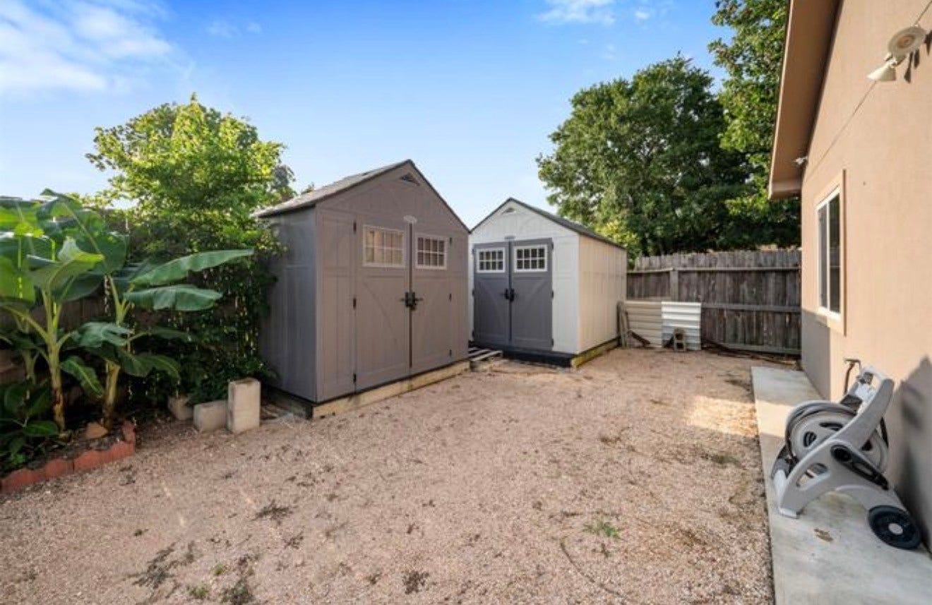 2526 Perez Road, Pasadena, TX 77502 sheds in the of the house