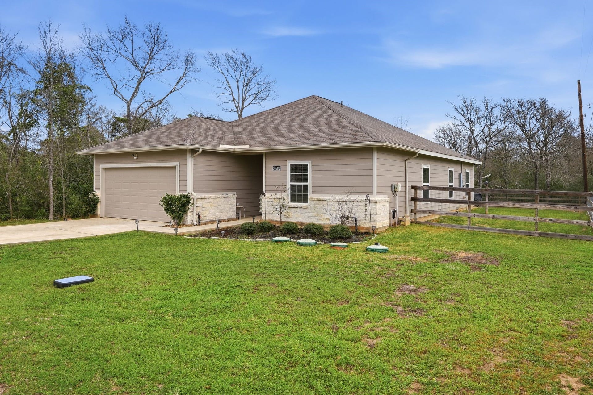 26582 Armadillo Drive, Hempstead, TX 77445 Home has a fenced in backyard on a large lot