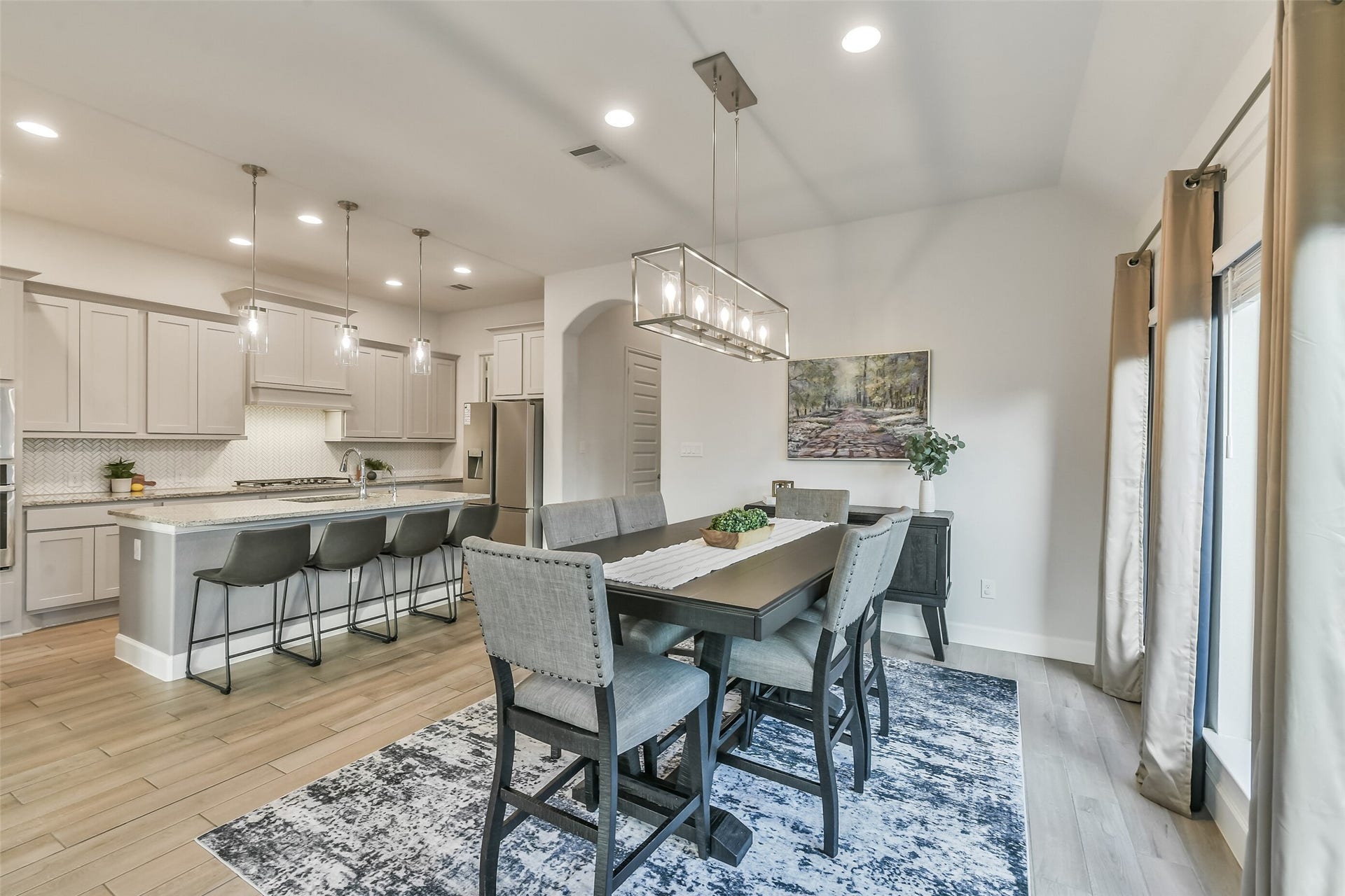 20815 Clydesdale Post Road, Tomball, TX 77377 The dining area features custom over the table lighting.