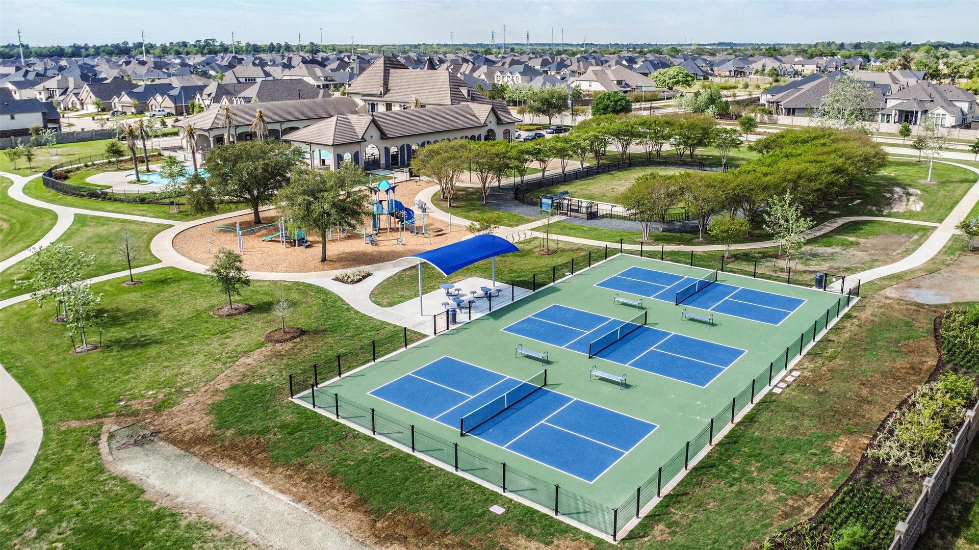 20815 Clydesdale Post Road, Tomball, TX 77377 Amira's pickleball courts, pool, dog park, and playground.