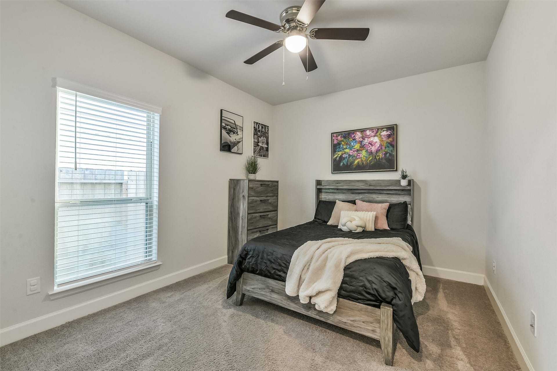 20815 Clydesdale Post Road, Tomball, TX 77377 Secondary bedroom #2 features a ceiling fan.