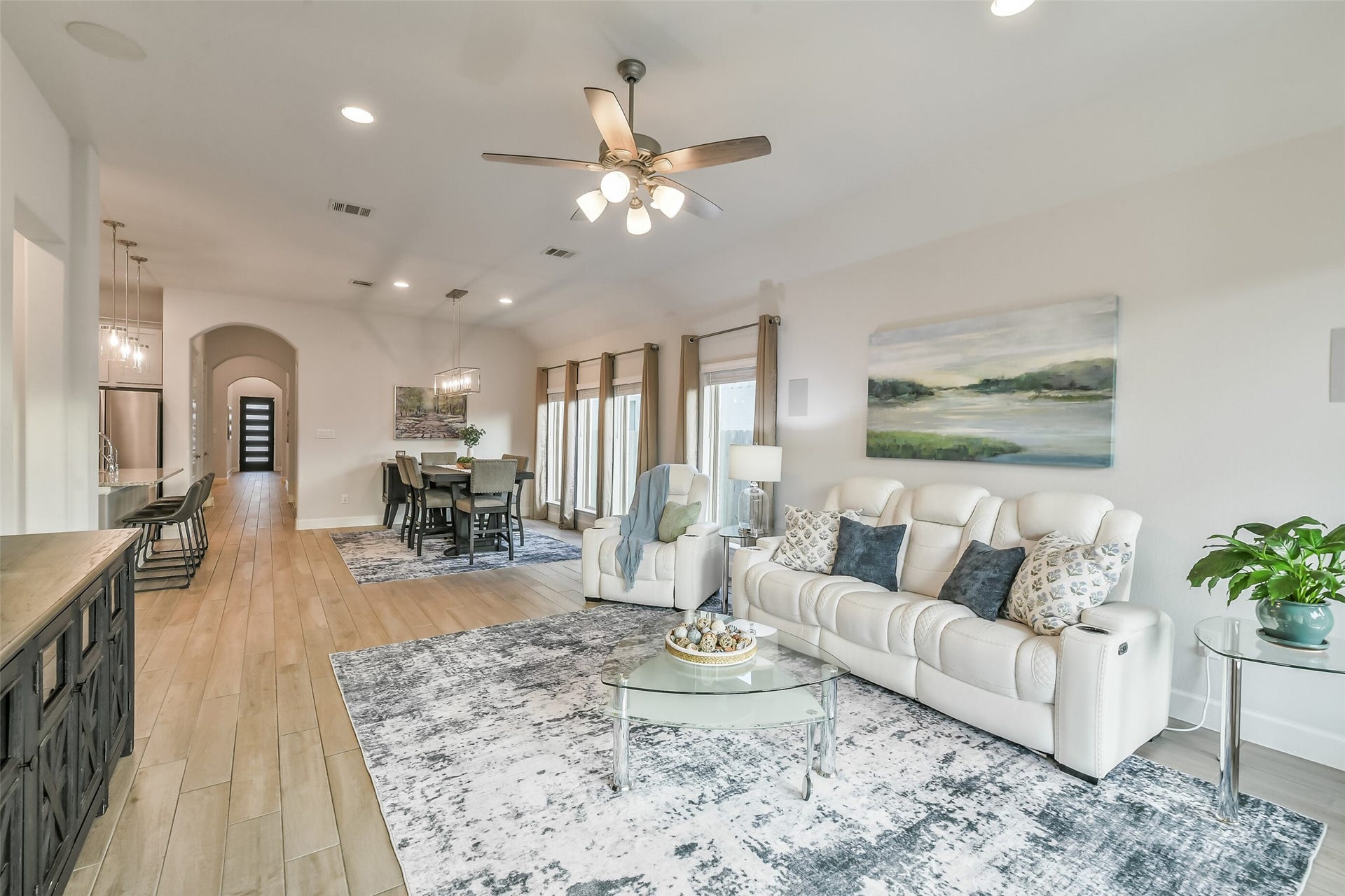 20815 Clydesdale Post Road, Tomball, TX 77377 Gorgeous tile flows throughout the entry, kitchen, dining, and living spaces.