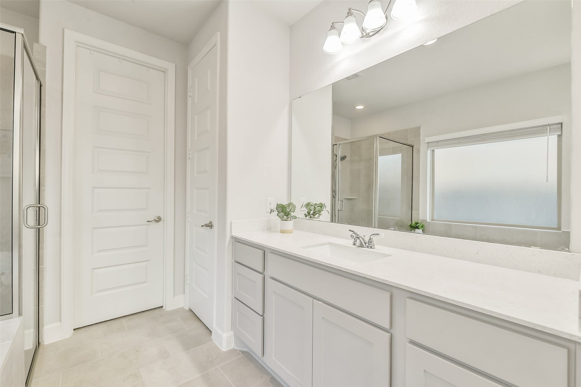 20815 Clydesdale Post Road, Tomball, TX 77377 The large mirrors over the sinks are perfect for getting ready for the day.