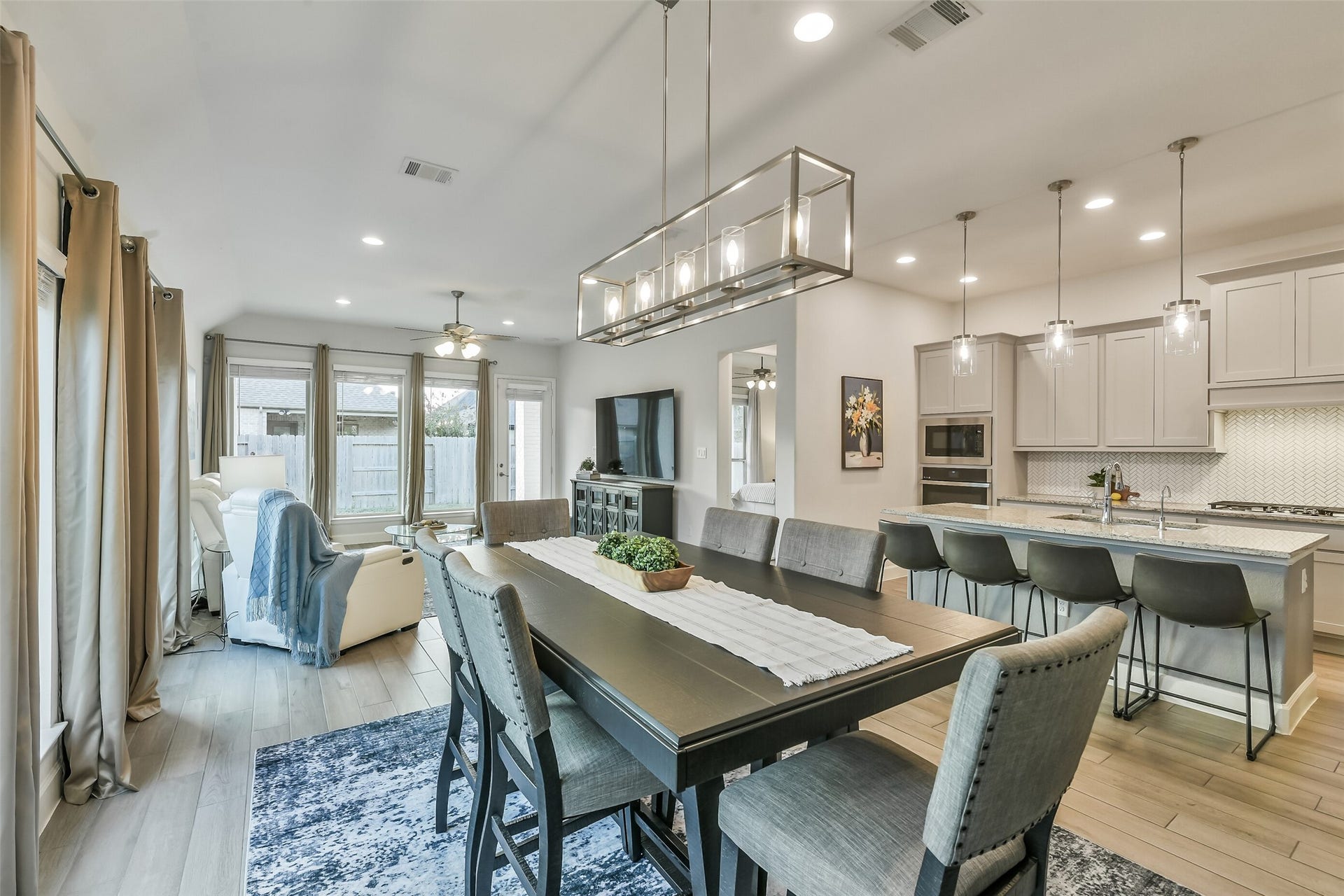 20815 Clydesdale Post Road, Tomball, TX 77377 The spaces are defined but still flow together.
