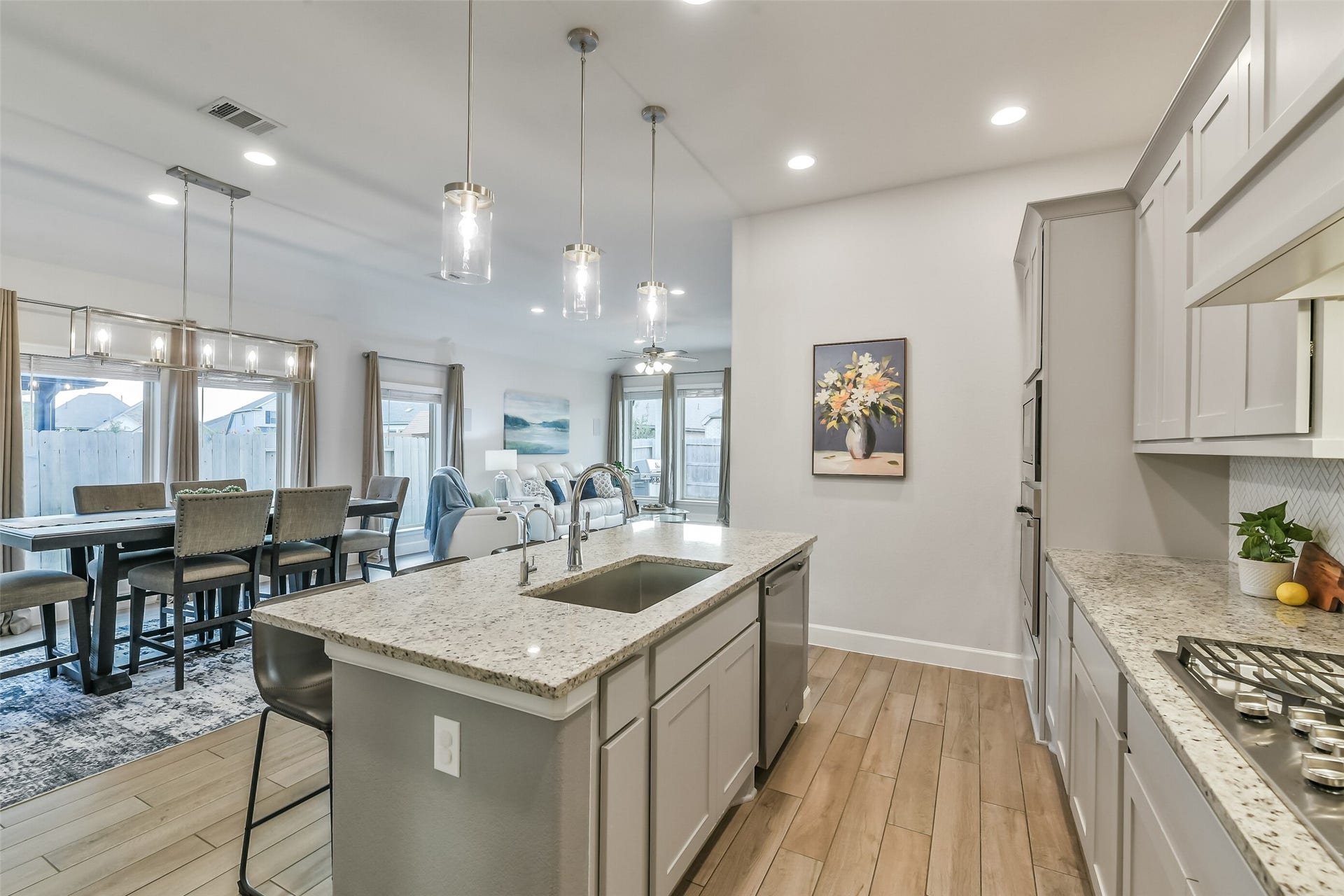 20815 Clydesdale Post Road, Tomball, TX 77377 The open floor plan allows the kitchen, dining area and living room to flow together.