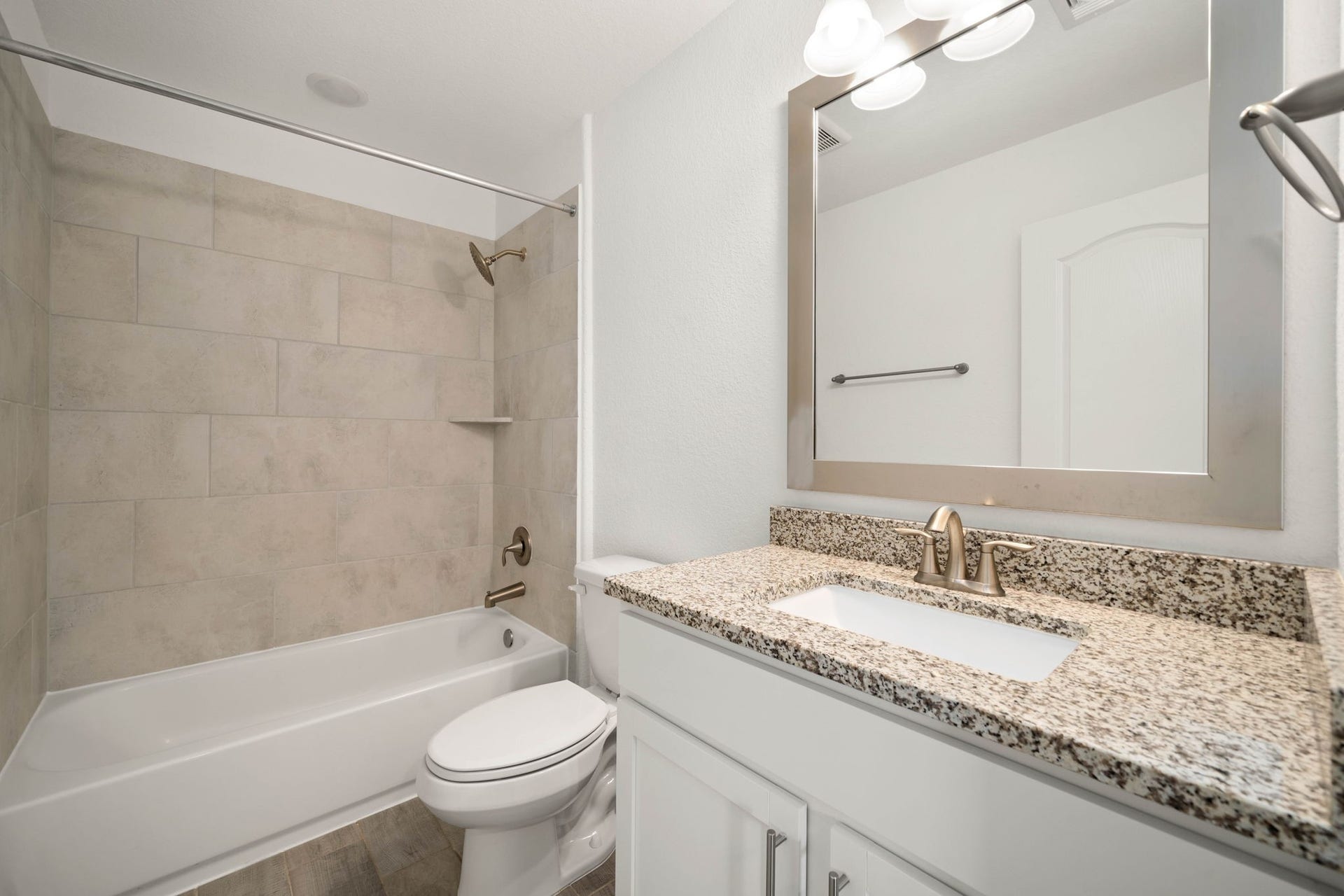 31619 Donoso Drive, Fulshear, TX 77441 A second full bath upstairs offers a granite vanity and tub/shower combo for added convenience.