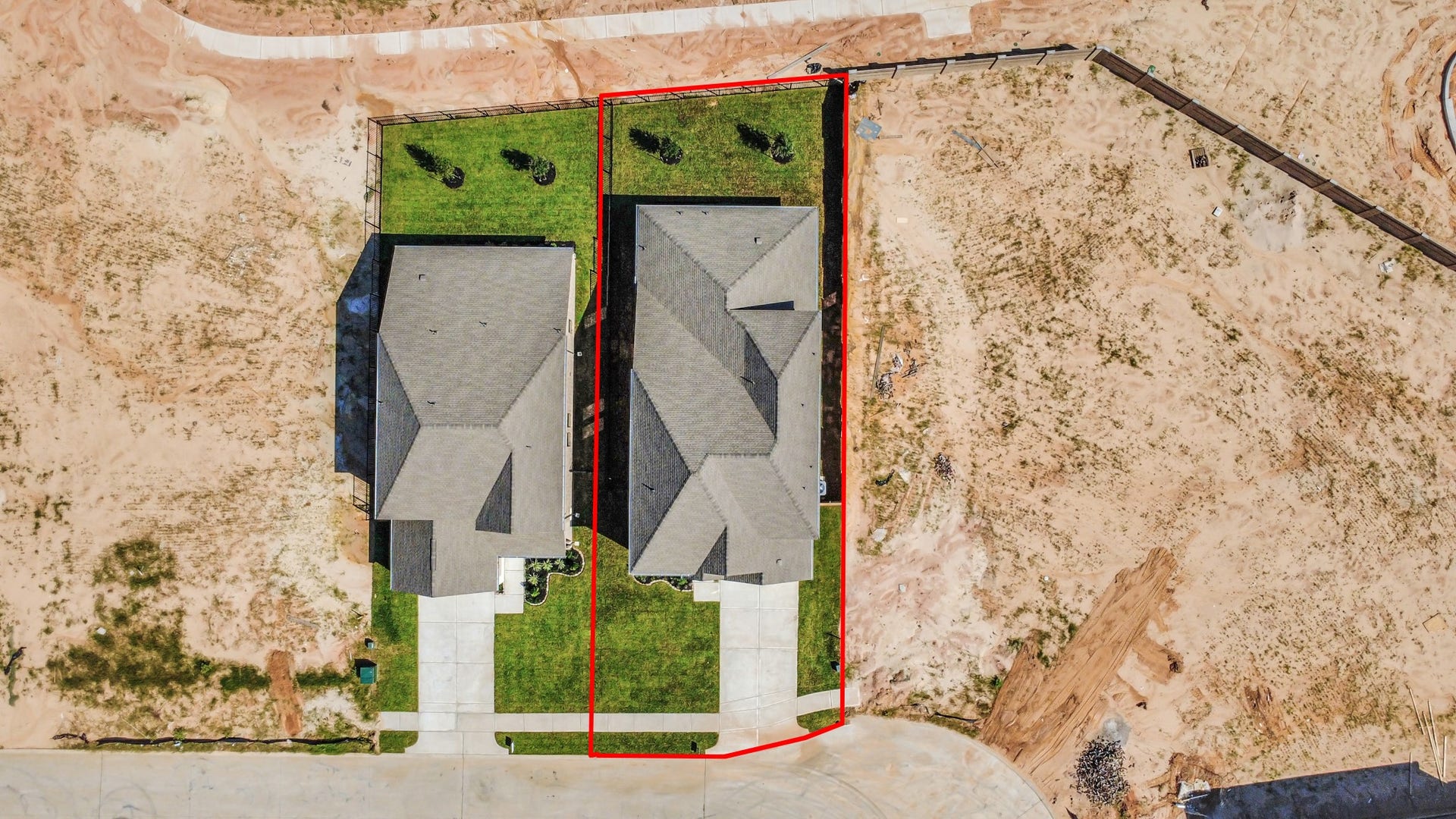 1021 Golden Glow Path, Magnolia, TX 77355 An aerial view of a spacious subdivision lot, highlighting a well-maintained yard and a fully fenced perimeter, offering both privacy and expansive outdoor space.