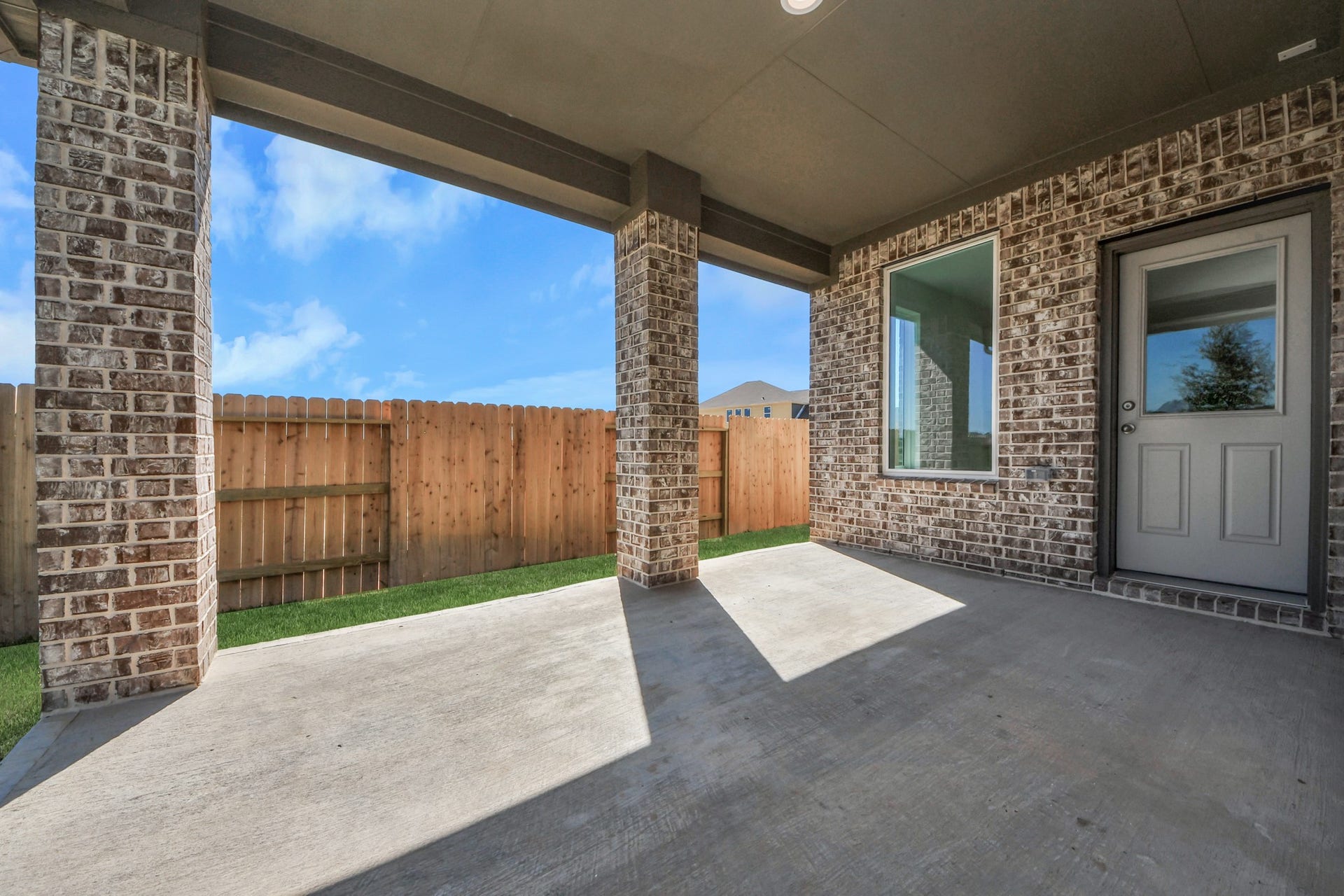 1021 Golden Glow Path, Magnolia, TX 77355 Backyard retreat, offering an abundance of space for kids to play and explore. The possibilities are endless in this outdoor haven, where the joy of open-air activities and family gatherings awaits.