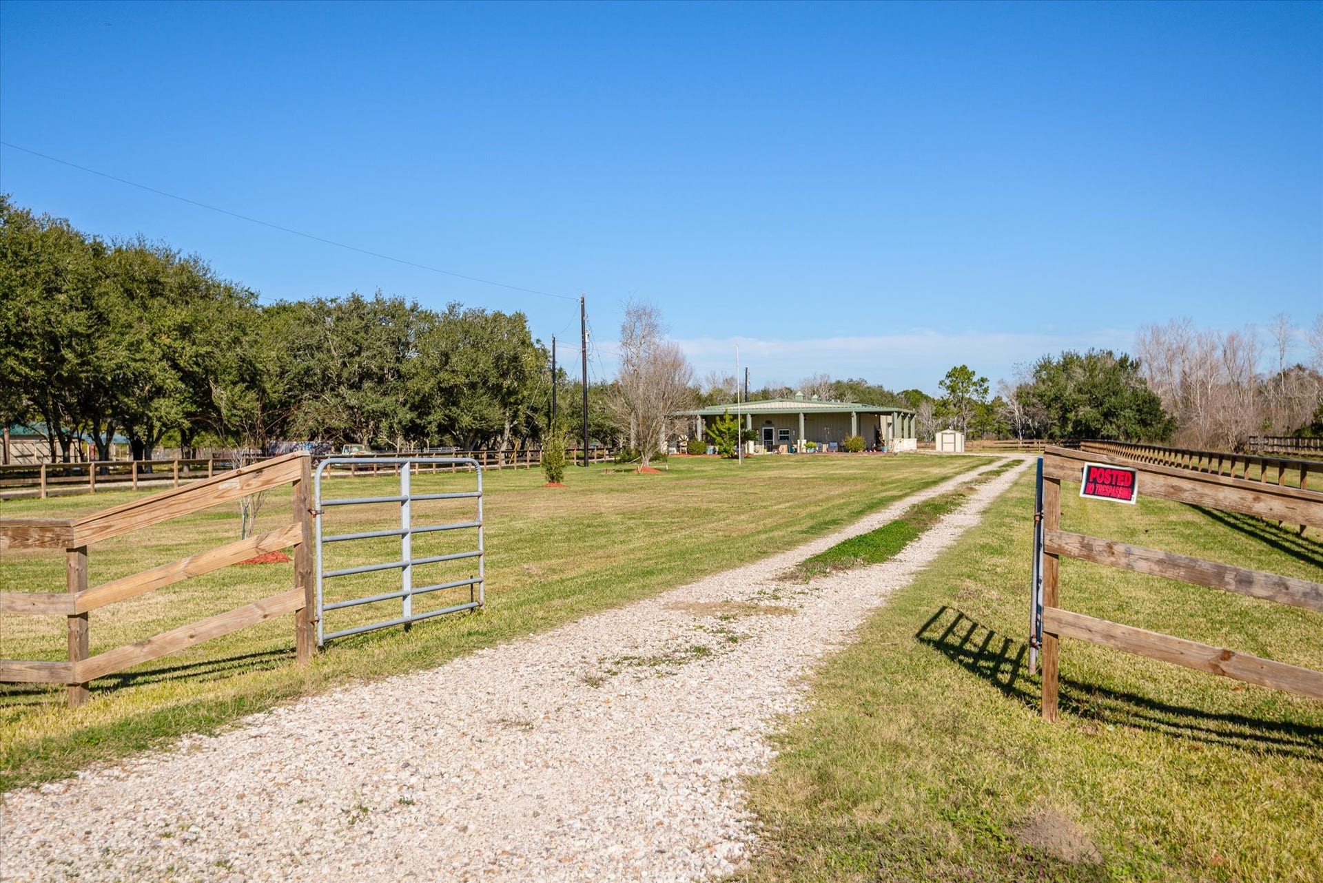 11578 28th Street, Santa Fe, TX 77510 Gated driveway for privacy.
