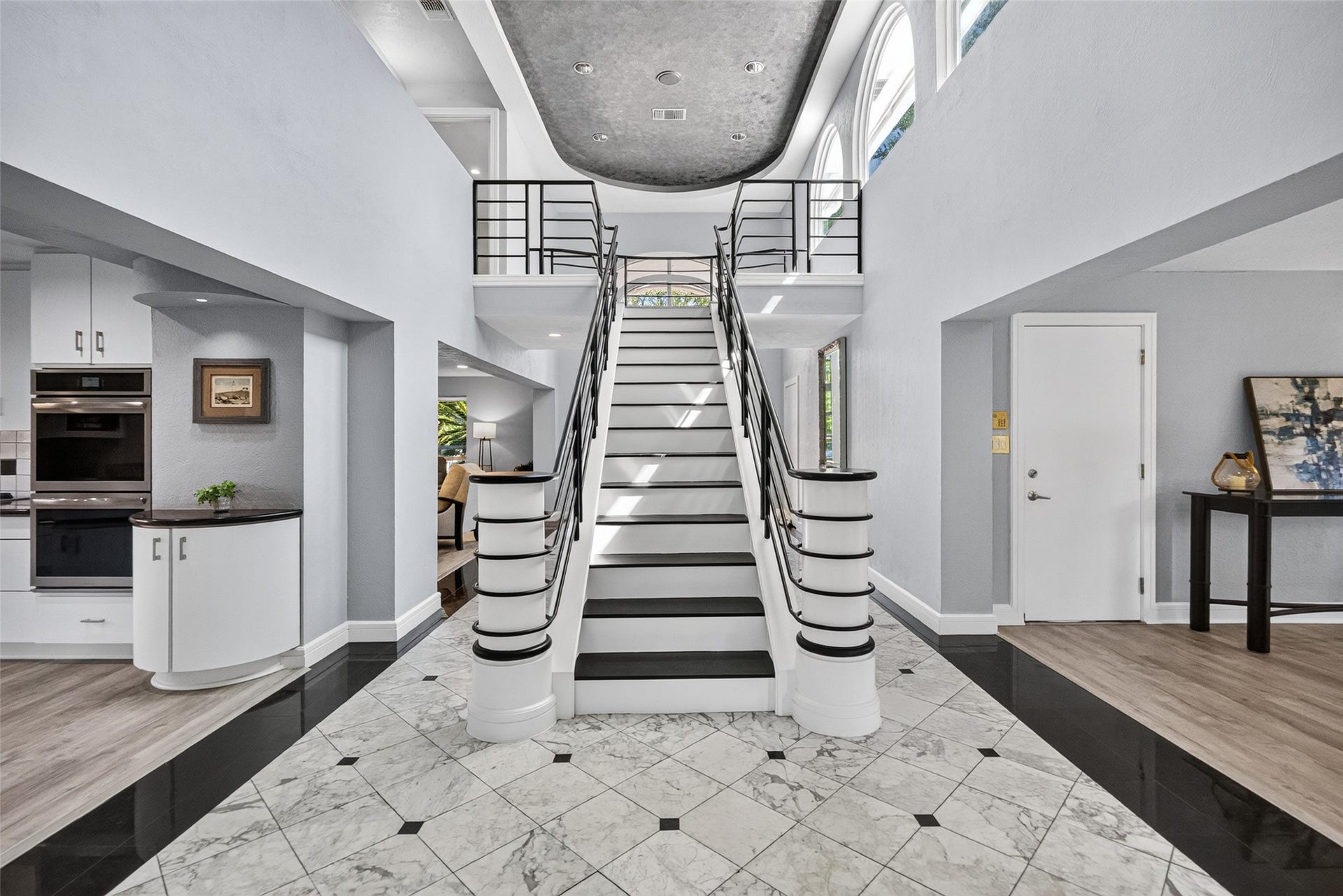 1003 Villa Court Drive, Seabrook, TX 77586 Marble floors and a grand staircase lead you to the second floor.