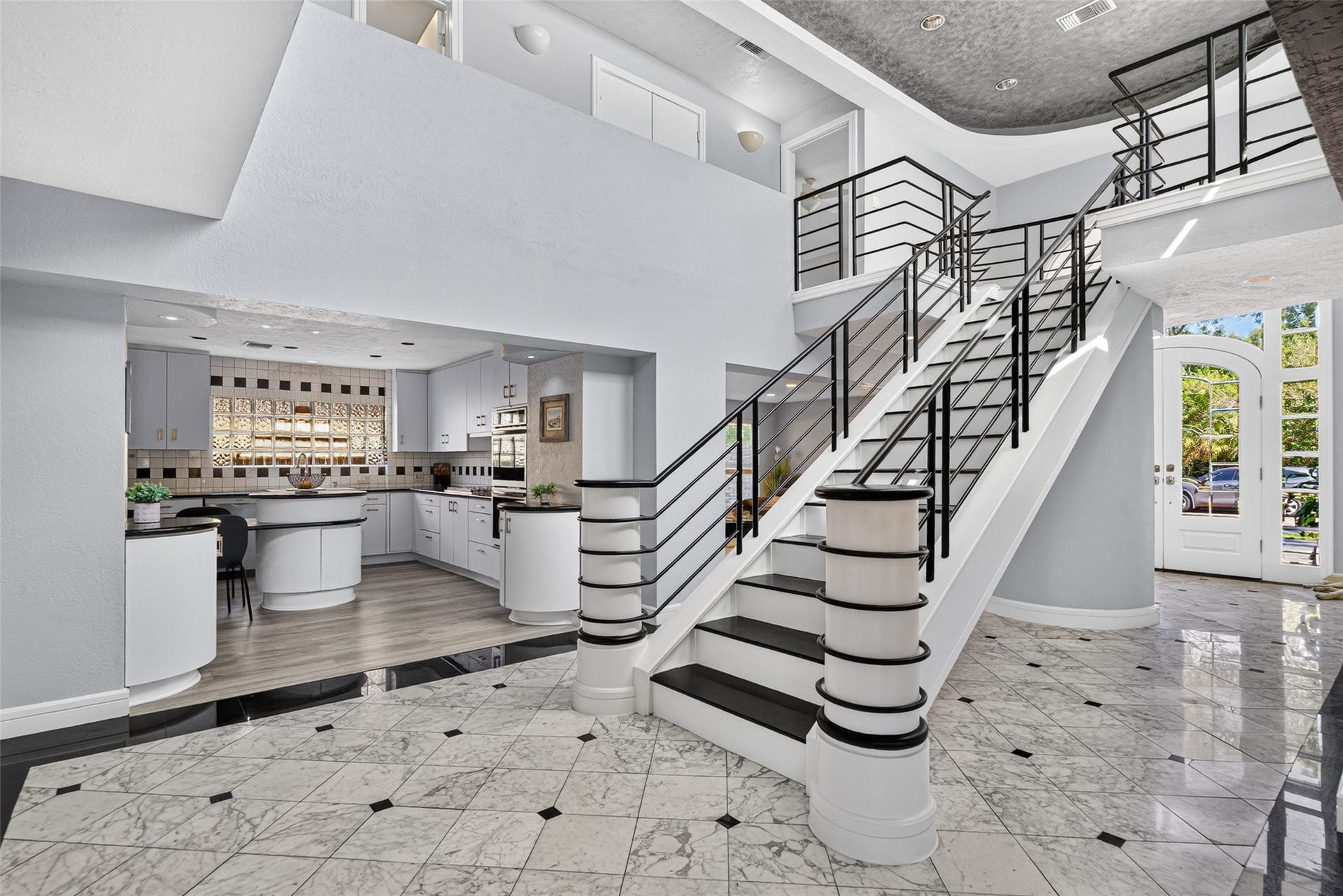 1003 Villa Court Drive, Seabrook, TX 77586 Architectural Showpiece Staircase.