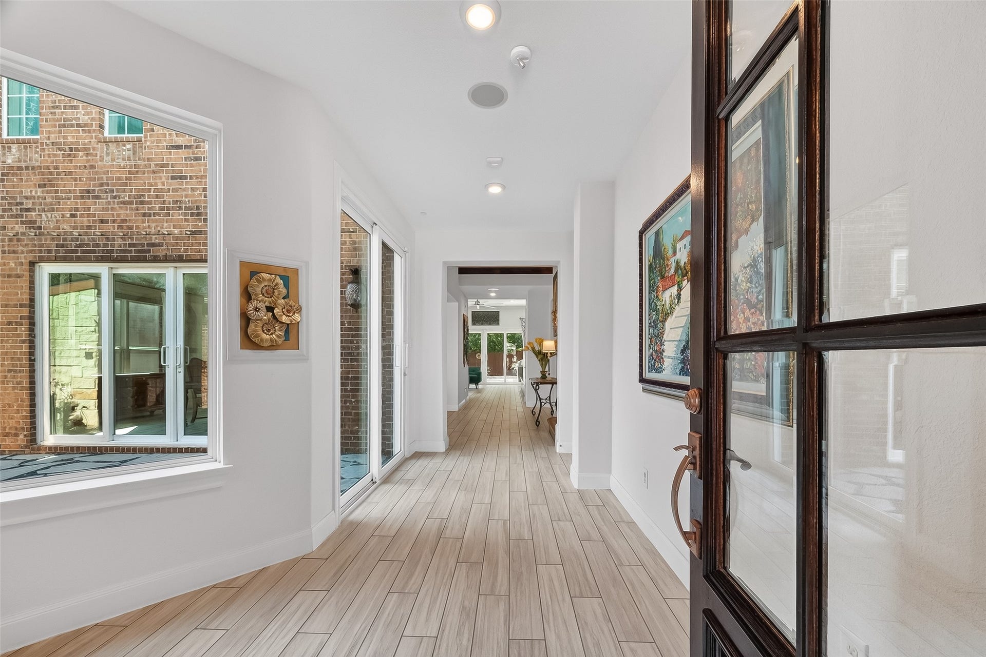 51 Scepter Ridge, Sugar Land, TX 77498 Step inside the entry gallery where clean lines and natural light create an open, airy feel. The wide sightlines hint at the spacious layout beyond and invite you to explore the home.