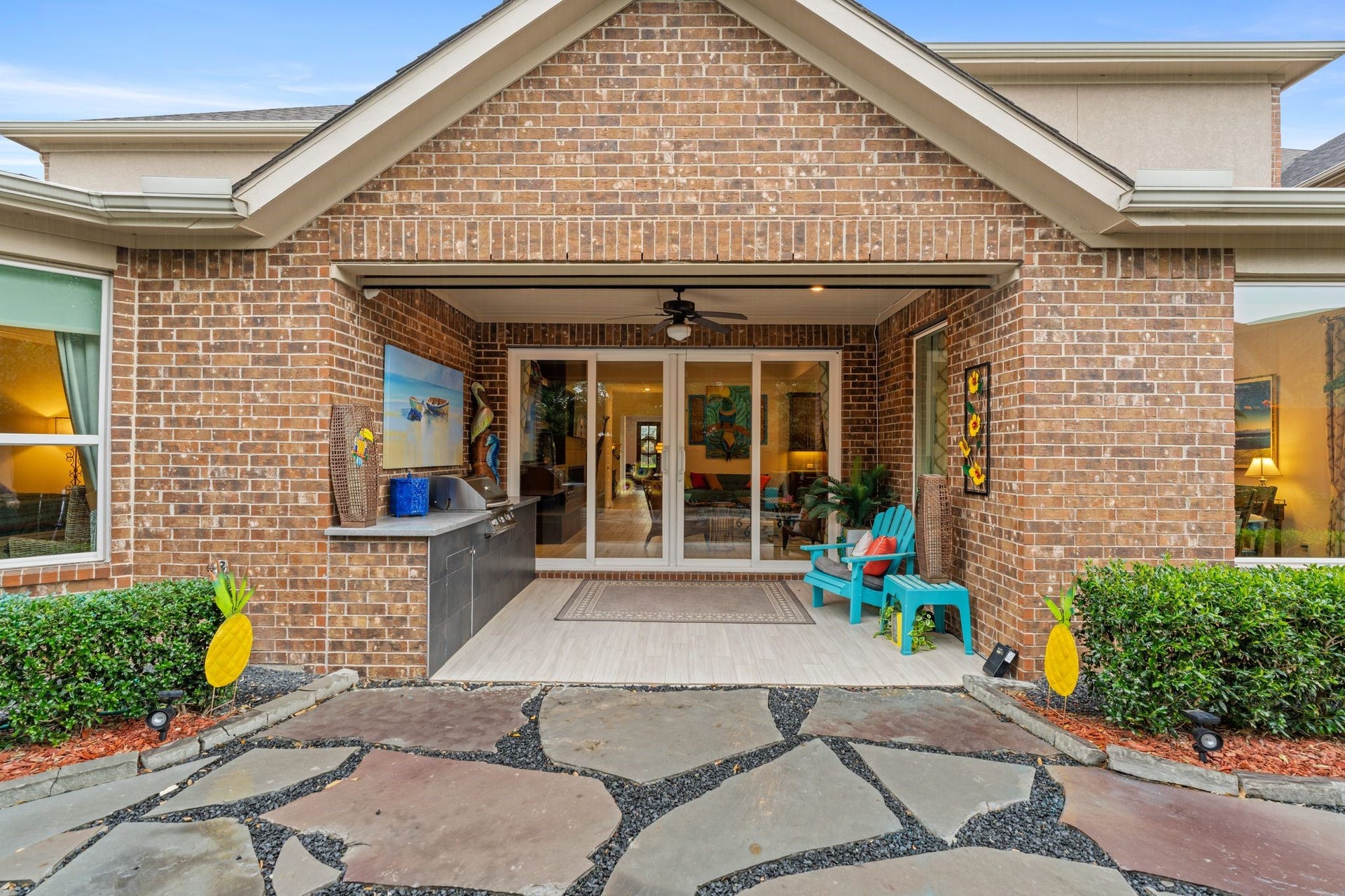 51 Scepter Ridge, Sugar Land, TX 77498 The covered outdoor living area extends the homes usable space. The indoor fireplace adds warmth and atmosphere for cooler nights, while the grill has all the hot food covered.