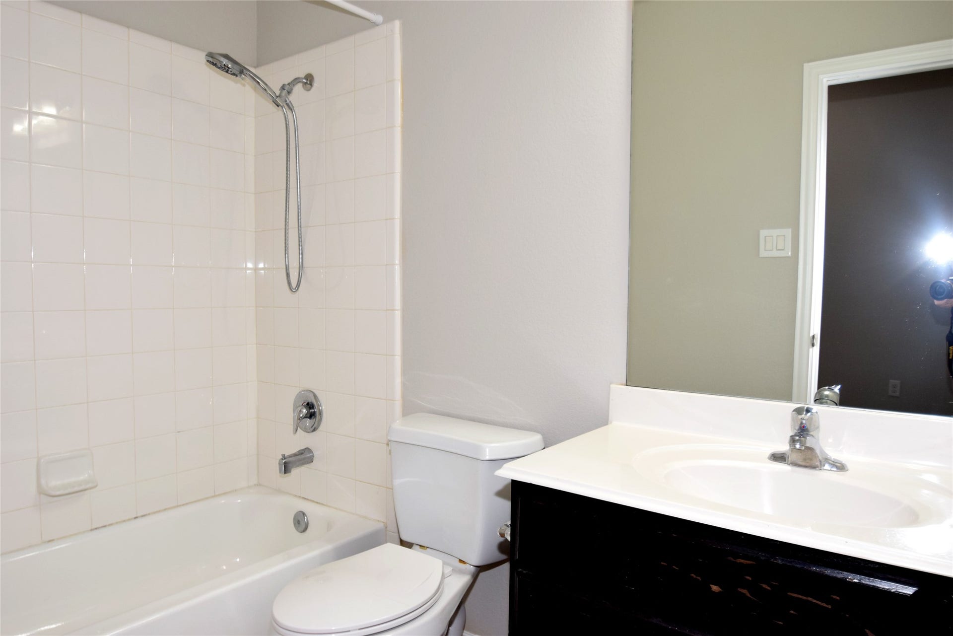 Full bath with a tub/shower.