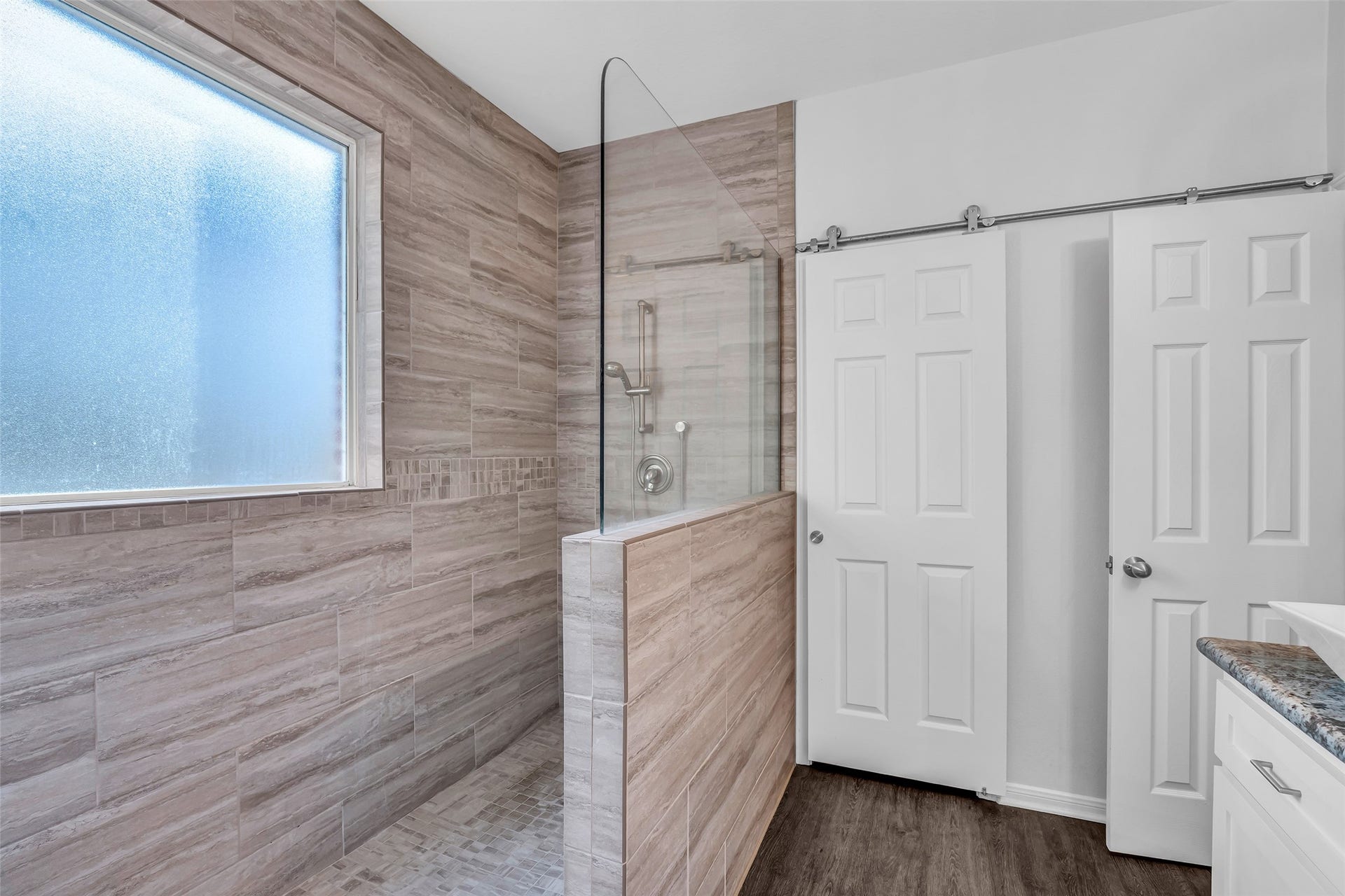 440 Magnolia Blossom, League City, TX 77573 No more telephone booth showers in this full walk in shower. Wow