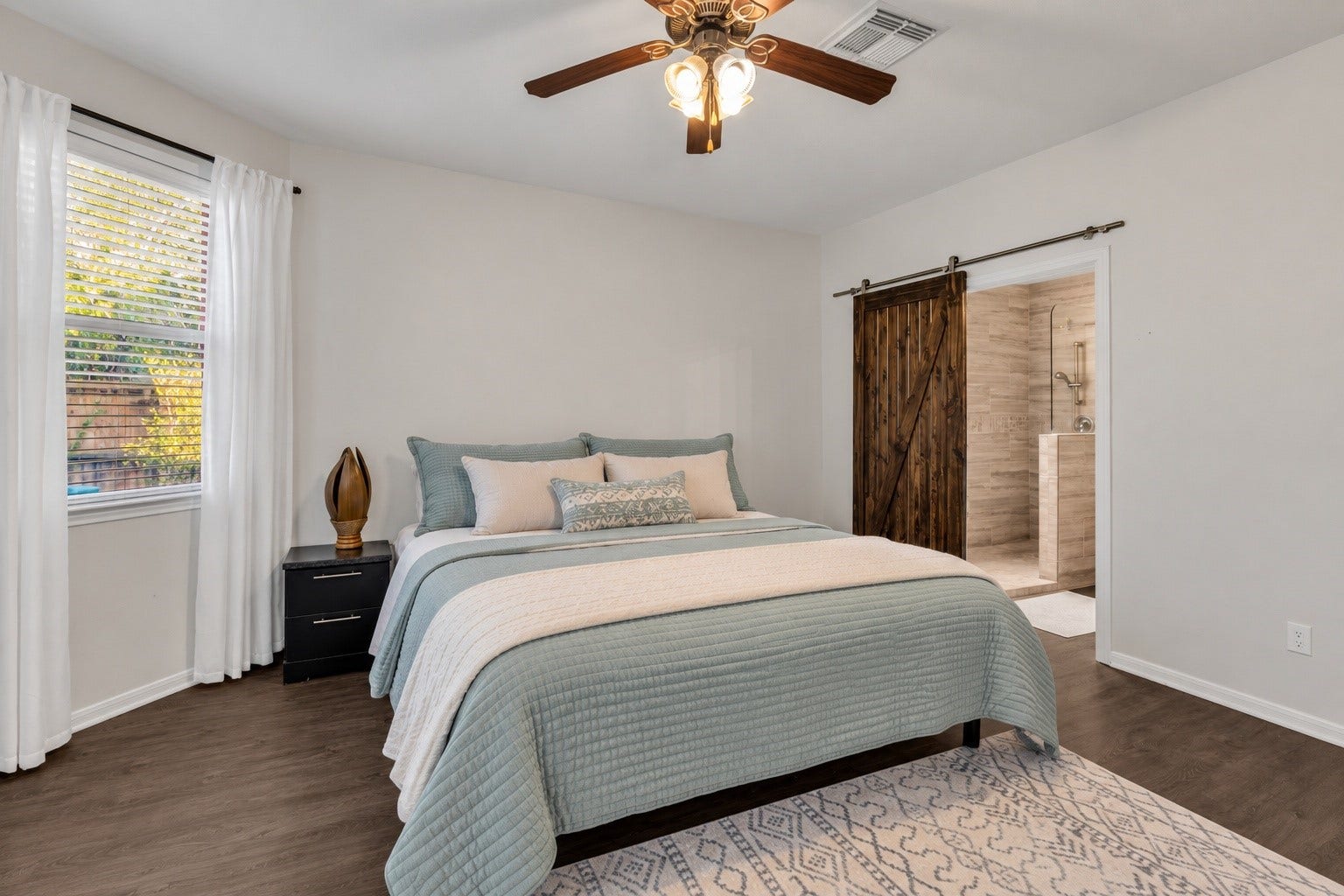 440 Magnolia Blossom, League City, TX 77573 Consistent updated flooring and your upgraded bathroom awaits.