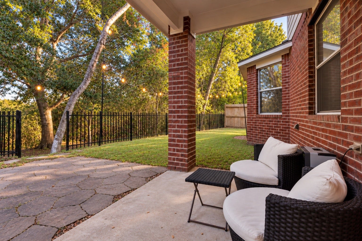 440 Magnolia Blossom, League City, TX 77573 The covered back patio and private wooded backyard is possibly the best feature of this gem.