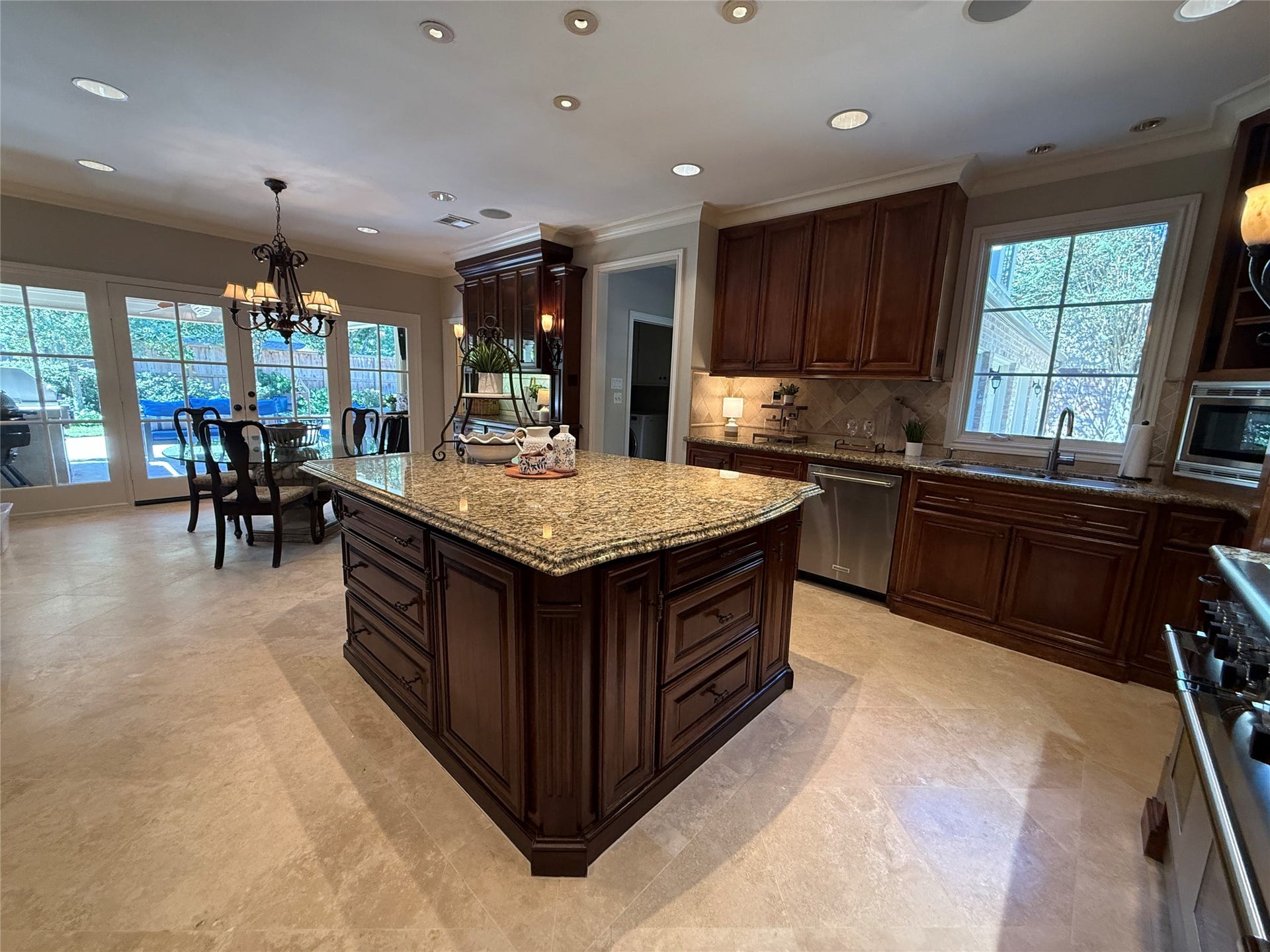 16131 Rudgewick Lane, Spring, TX 77379 View of the breakfast room, built in lighted cabinet and door to the powder bath.