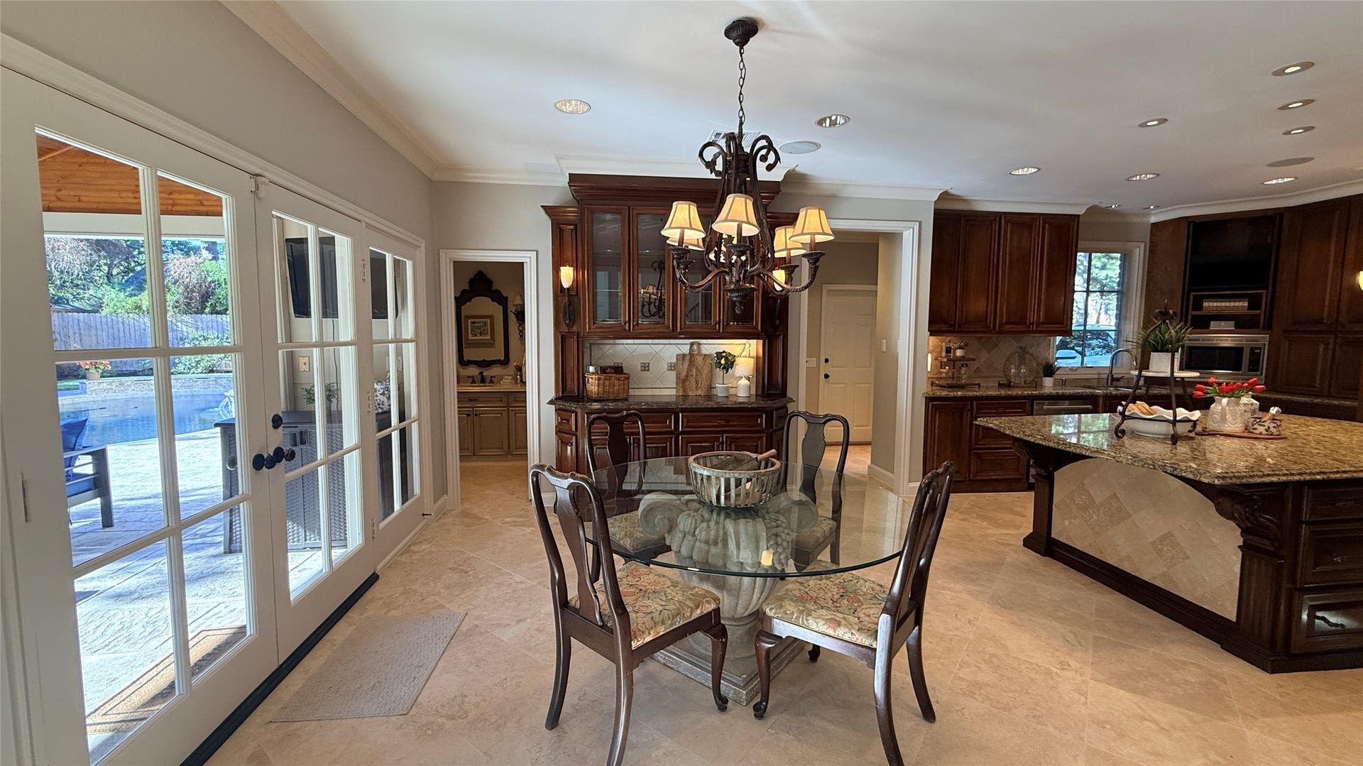 16131 Rudgewick Lane, Spring, TX 77379 View of the breakfast room, built in lighted cabinet and door to the powder bath.
