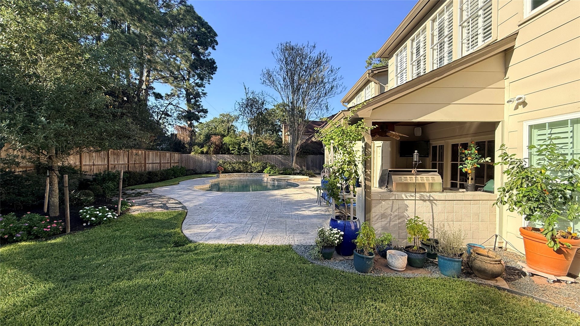 16131 Rudgewick Lane, Spring, TX 77379 View of the pool and covered patio.