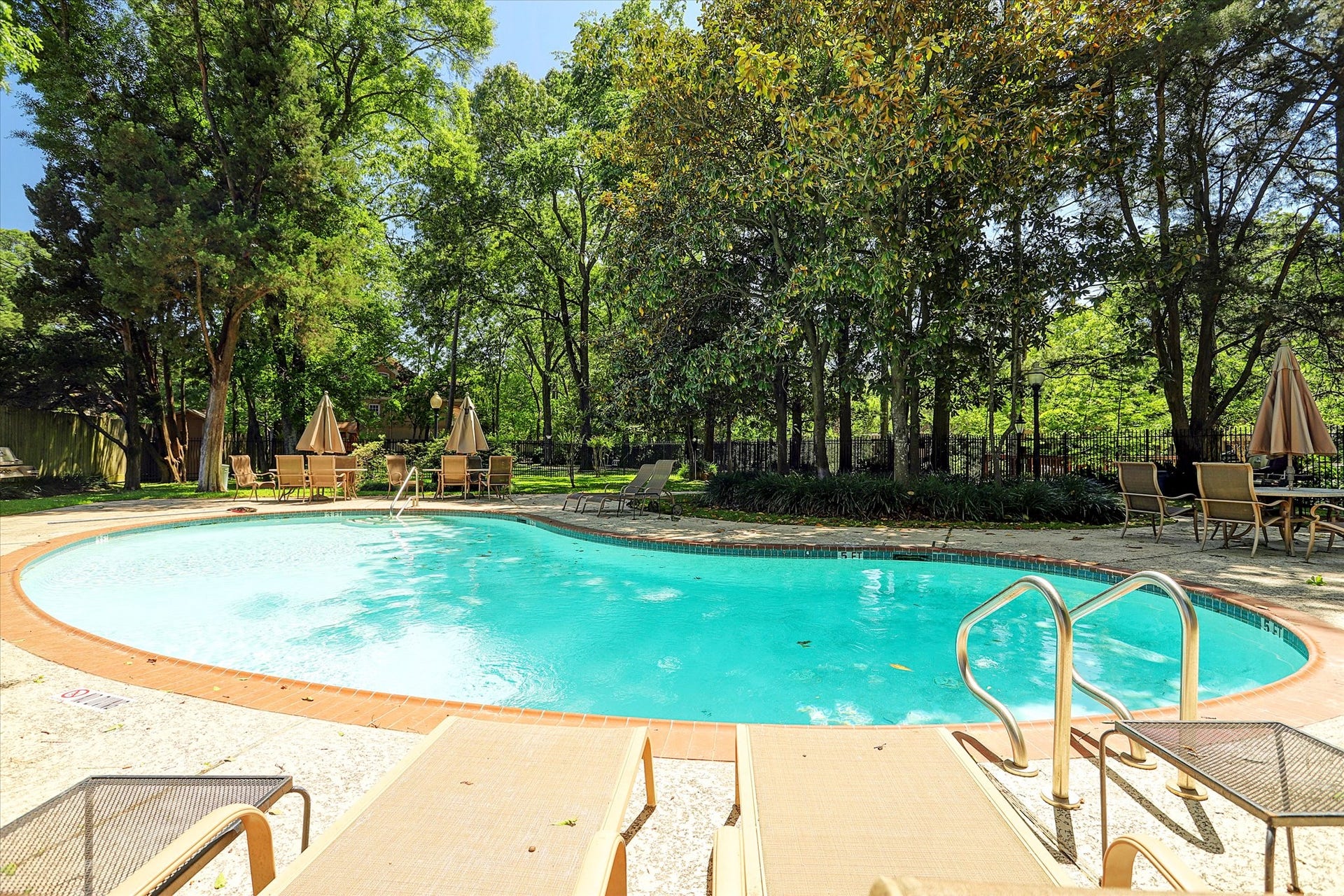 Sizable kidney shaped pool.