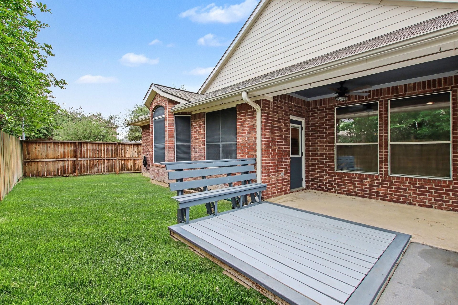 12843 Sherlock Acres Drive, Tomball, TX 77377 Off the extended deck is ample green space.