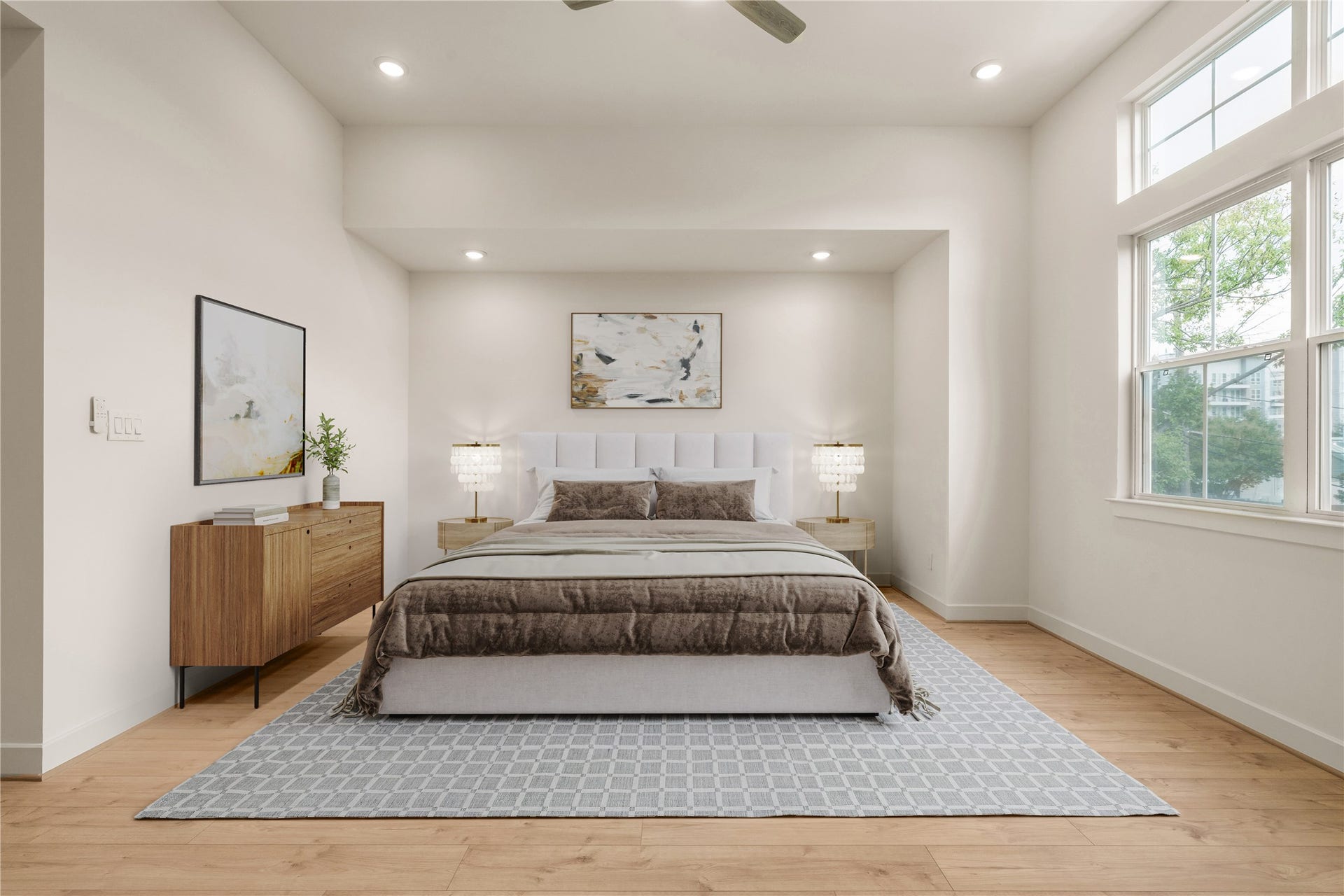 5018 Schuler Street, Houston, TX 77007 Primary suite sanctuary symmetrical layout with dual nightstands, elegant table lamps, neutral area rug, and large picture window framing lush neighborhood views.