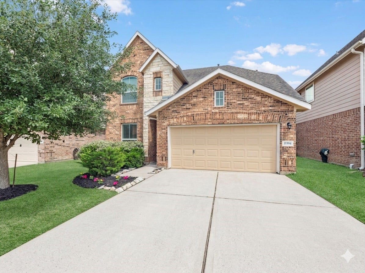 Welcome home!  Charming brick home with a well-maintained front yard, featuring a two-car garage and a neatly landscaped low maintenance lawn.