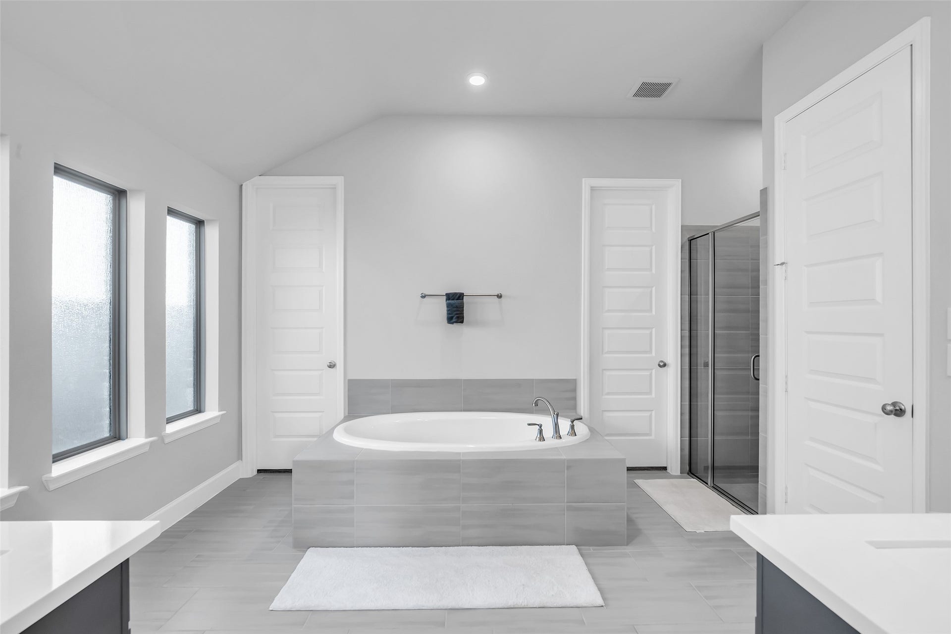 30047 Gold Finch Place, Fulshear, TX 77441 Maximize Relaxation In Your Spacious & Elegant Bathroom: Featuring A Large, Soaking Tub, Separate Glass-enclosed Shower, & Abundant Privacy & Natural Light From Large Frosted Windows.