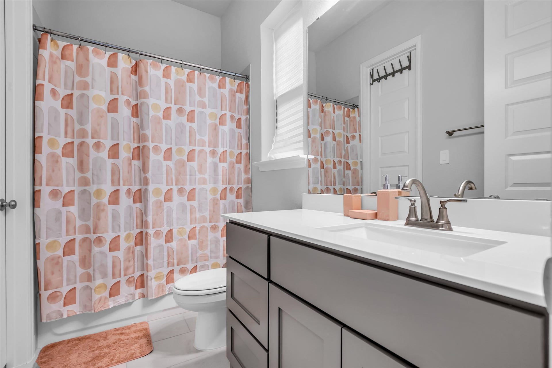 30047 Gold Finch Place, Fulshear, TX 77441 Ensuite Bath #1: w/ Sleek Fixtures, Large Vanity, & Stylish Design