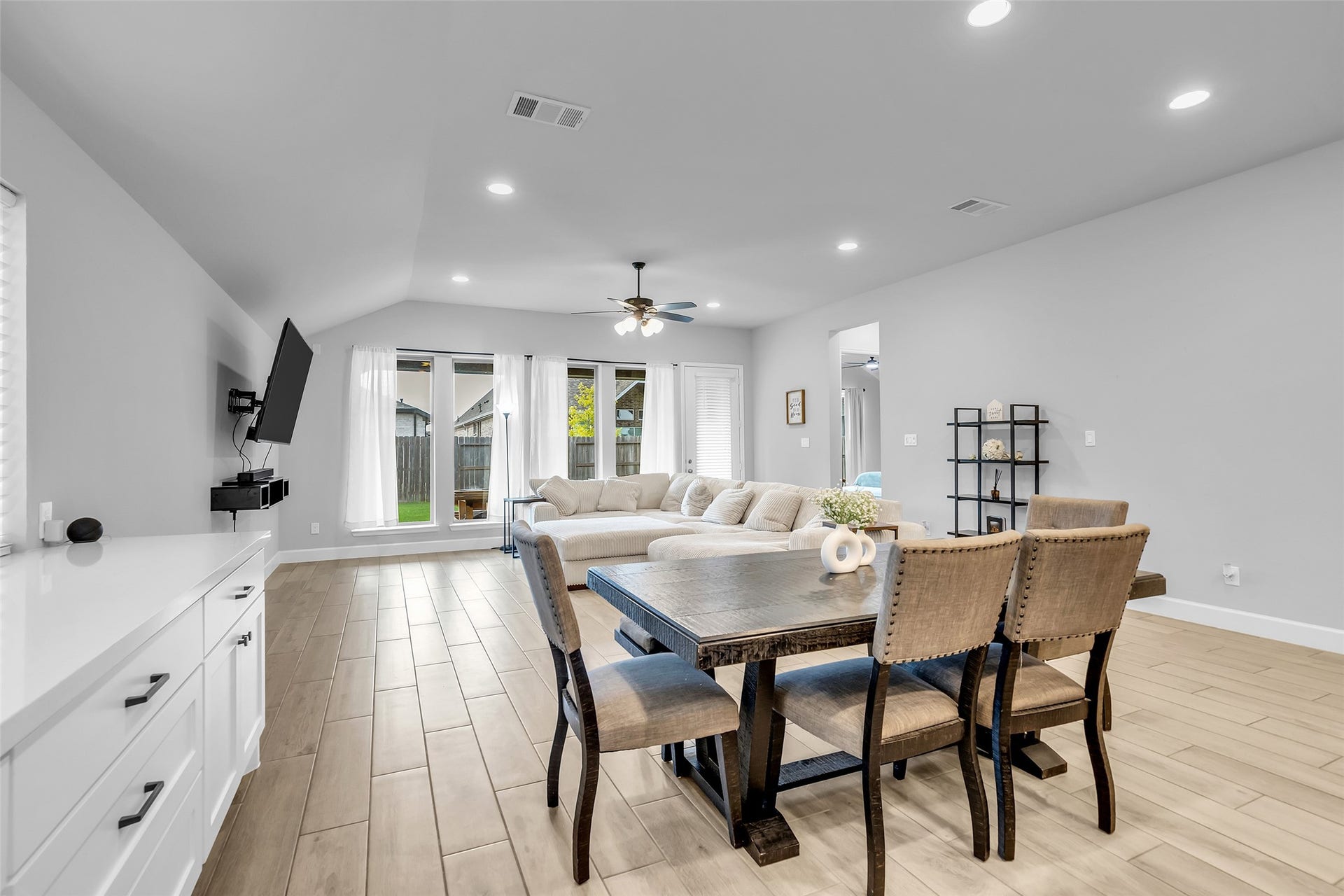 30047 Gold Finch Place, Fulshear, TX 77441 Spacious, Flowing, & Elegant: Modern Finishes, Wood Plank Tiling, Floor to Ceiling Windows For Ample, Natural Light.