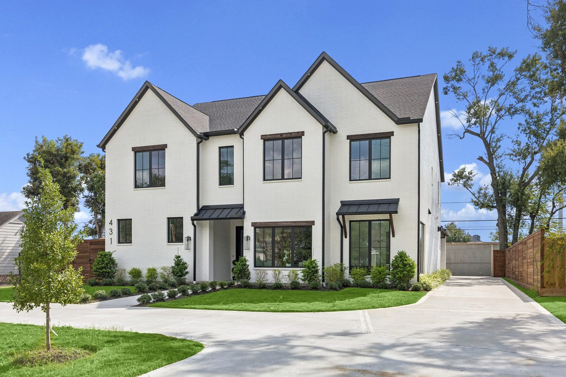 431 W 30th Street, Houston, TX 77018 Welcoming front entrance illuminated for elegance.
