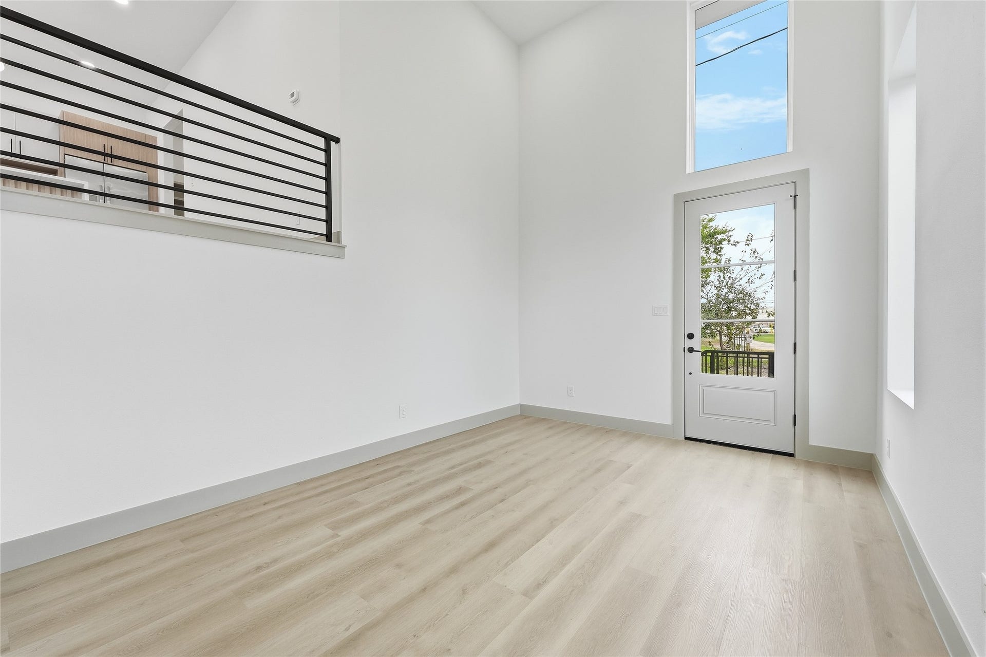 First Floor Living with 20 FT Ceilings
